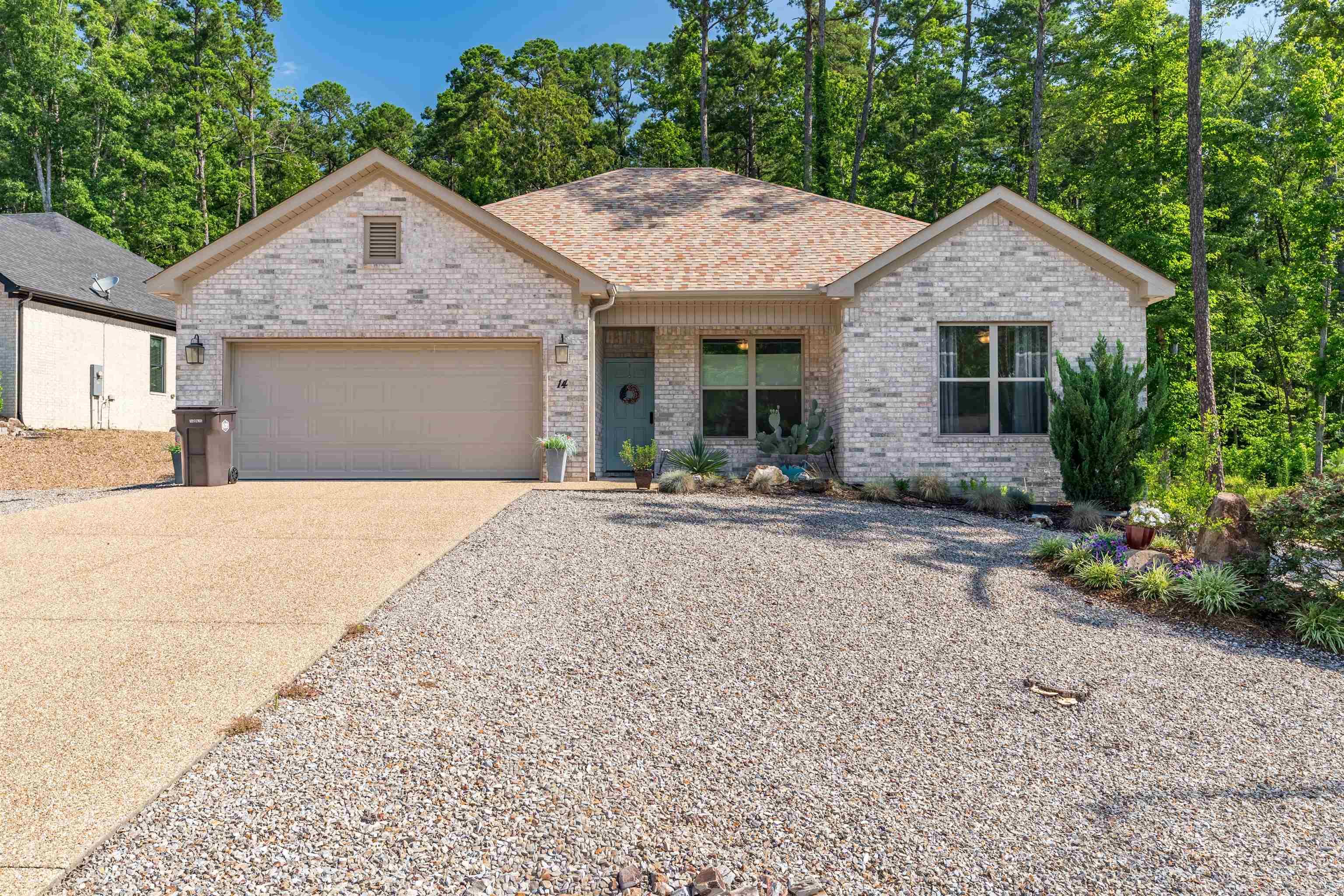 Welcome to this beautifully crafted Renaissance-built home in the Siega Subdivision of Hot Springs Village. Completed in 2021, this all-brick residence blends modern comfort with timeless quality. The home features 3 bedrooms (split plan), 2 baths, and a 2-car garage, offering an ideal layout for easy living.  Step inside to discover an inviting open-concept design, highlighted by thoughtful finishes and abundant natural light. The kitchen, living, and dining areas flow seamlessly which is perfect for everyday living or entertaining. The primary suite provides a peaceful retreat and modern bath that is handicap accessible. Two additional bedrooms offer flexibility for guests, hobbies, or a home office.  Outside, the all-brick exterior ensures low maintenance and lasting durability, while the property’s location places you near the Village’s renowned amenities, lakes, trails, and golf courses.  The Siega Subdivision is encircled by the Hernando Trail and is easily accessible from your backyard. A 2021 Renaissance home with quality craftsmanship, modern efficiency, and classic curb appeal—this one is move-in ready and waiting for you.