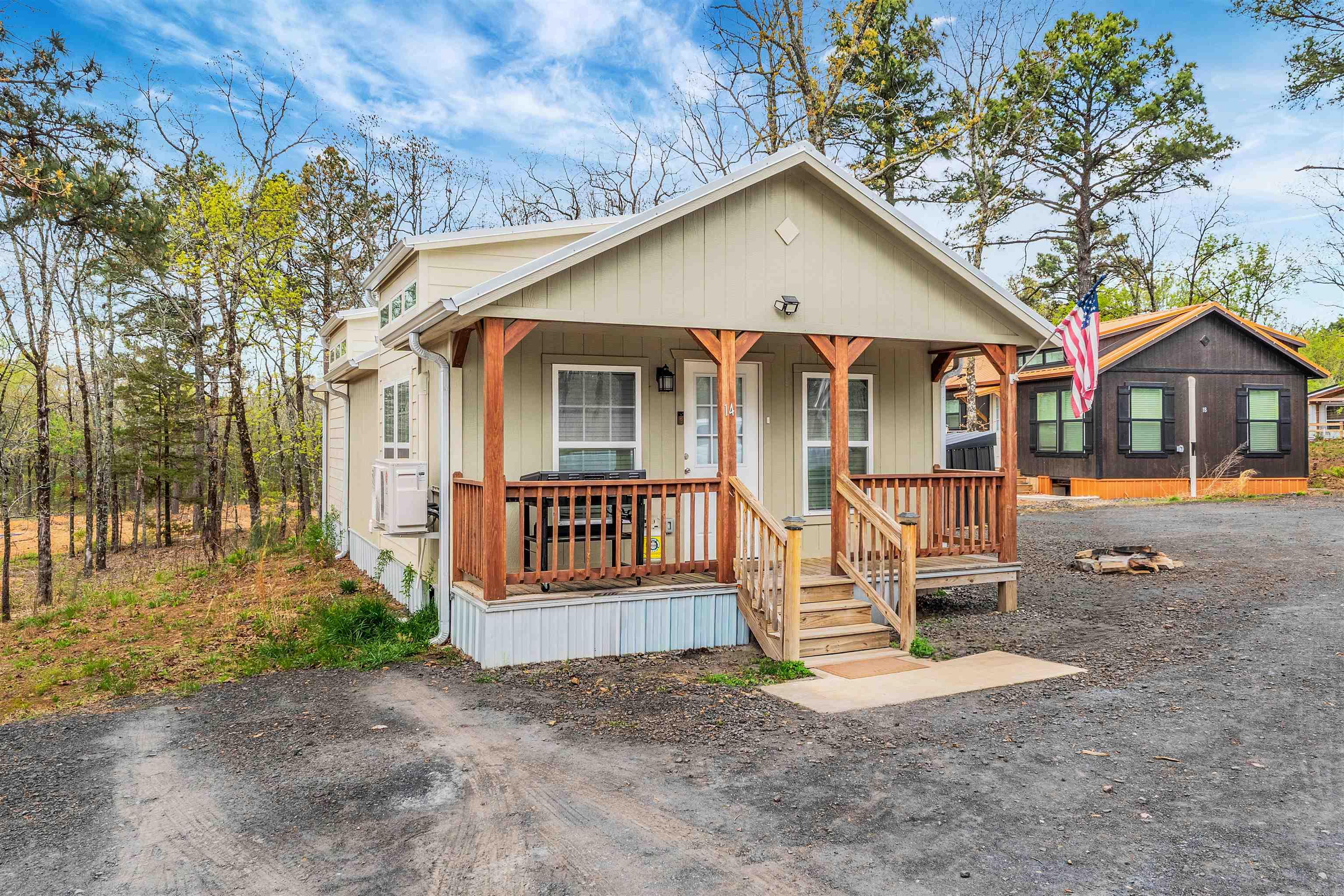 INVESTORS - This is the perfect investment opportunity to add newer homes to your portfolio PLUS have room for growth. Sitting on over 5 acres Tiny Town welcomes you. This is made of 5 Low efficiency modern farm style home ranging from 750 Sq ft to 1302 Sq ft of country living and close to town. There is three (3) - 1 Bedroom/1 Bath, One (1) - 2 Bedroom/1 Bath and One (1) - 2 Bedroom / 2 Bath. All 5 are tenant occupied. There is eleven (11) additional vacant lots to build more, put campers and grow your rental portfolio. Electric and water is on site for the additional lots. What a perfect opportunity to put your goals to action. Schedule your showing today and dont miss out!!!