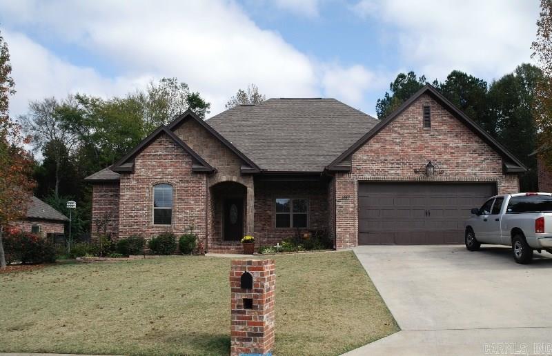 GREAT 4 BEDROOM HOME with two dining areas. Wood flooring in entry, dining & living areas. Upgraded stainless kitchen appliances include a wall oven & built-in microwave, gas cooktop. Beautiful stained custom cabinetry with rich dark granite countertops. Masterbath has double sink vanity & spa steam shower (See Agent Remarks) Inviting covered back deck looks onto wooded area behind & privacy fenced lawn. Living room features a gas log fireplace and tall 10' ceilings. Tankless hot water heater for efficiency