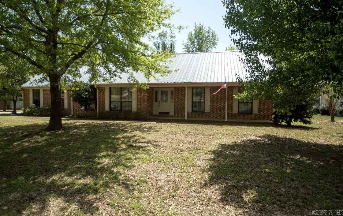 Great home with 4 bedrooms and 2 baths. This home offers two living spaces on with fireplace, formal dining room, spacious kitchen, large bedrooms and tons of storage. Great screened in back porch and large back yard. Don't miss out on this great listing! SEE AGENT REMARKS.
