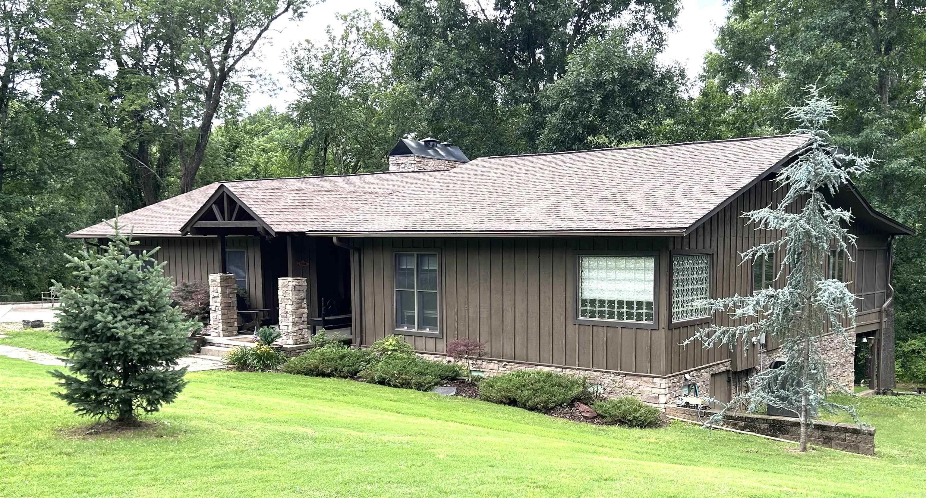 Tucked away near the beautiful Little Red River, this inviting property offers the perfect combination of comfort, storage, and outdoor living. Featuring two storage buildings, there’s plenty of room for boats, tools, fishing gear, and hobbies. Enjoy peaceful mornings and relaxing evenings from the spacious screened-in porch overlooking the natural surroundings. A private boat dock makes this property a dream for fishing and boating enthusiasts, offering quick access to the water and the laid-back river lifestyle buyers are looking for.