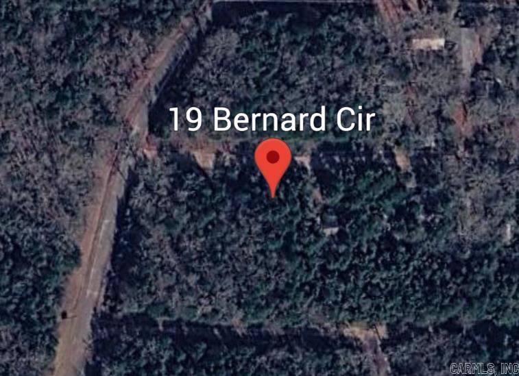 Build your dream getaway in the beautiful Ozarks! This lot at 19 Bernard Circle in Hardy, Arkansas offers a wonderful opportunity to own land in a peaceful area known for its natural beauty and small-town charm.  Tucked away in a quiet setting, this property provides the perfect place to build a home, cabin, or weekend retreat. Enjoy the serenity of the countryside while still being just minutes from historic downtown Hardy, the Spring River, and outdoor recreation like fishing, floating, and exploring the Ozark hills.  Whether you're looking for a relaxing escape, a future homesite, or an investment in land, this property offers a chance to create something special in one of North Arkansas’ most scenic areas. Call today before its gone tommorw.