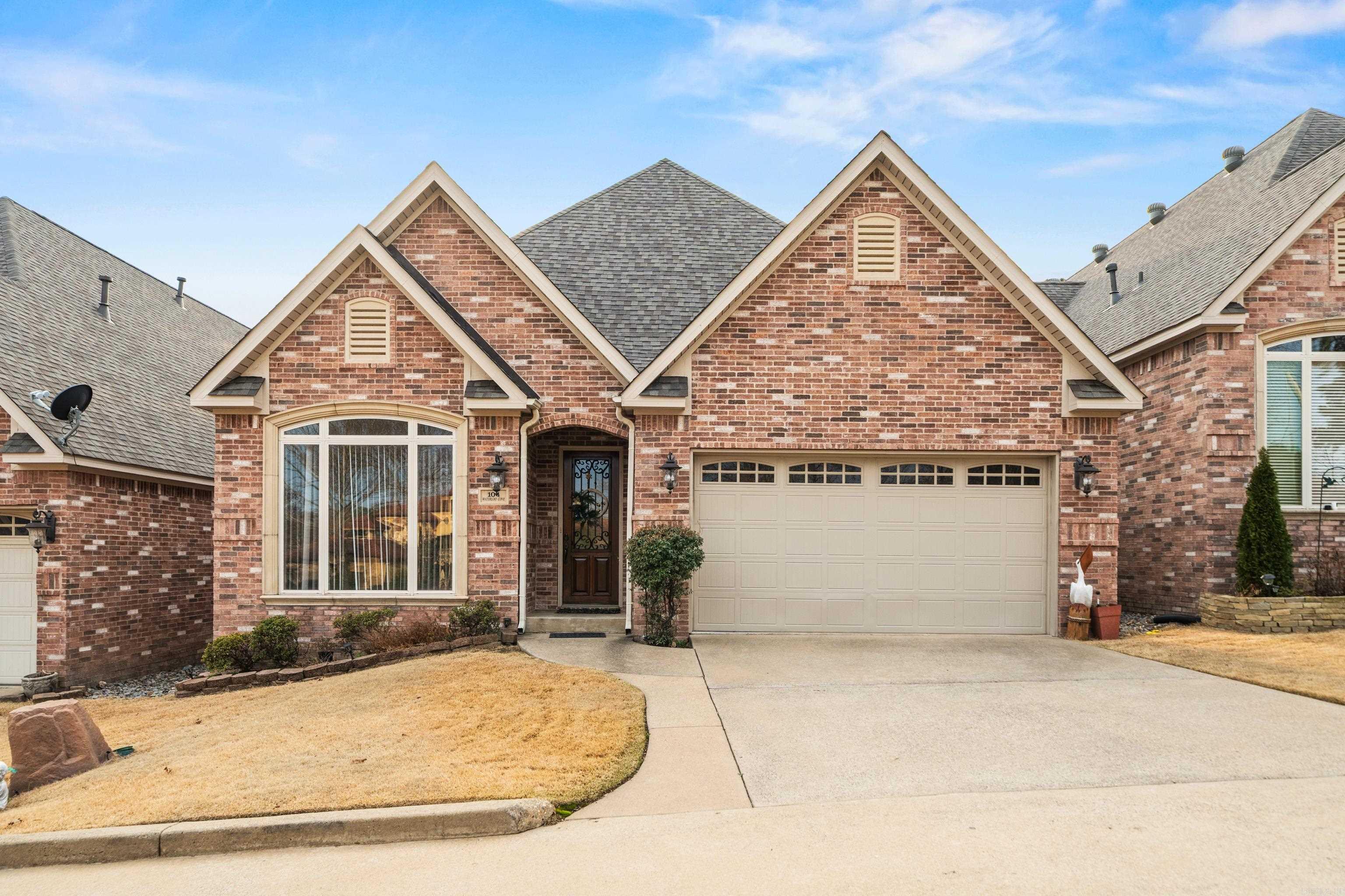 Welcome to your beautiful retreat just steps from Lake Hamilton! Located in one of Hot Springs’ premier gated communities and the Lakeside School District, this immaculate 4-bed, 3-bath home boasts 3,615 sq. ft. of elegant living space. Enjoy 10' ceilings, a gourmet kitchen with stainless appliances and island, spa-like primary suite, and versatile upstairs living area.Recent updates include a new roof, dual HVAC systems, Bosch dishwasher, and more—over $50K in improvements! HOA handles all yard work, and residents enjoy a community swim dock just a 30-second walk away. Don't miss this beautifully maintained lake-area gem—perfect for relaxing or entertaining!