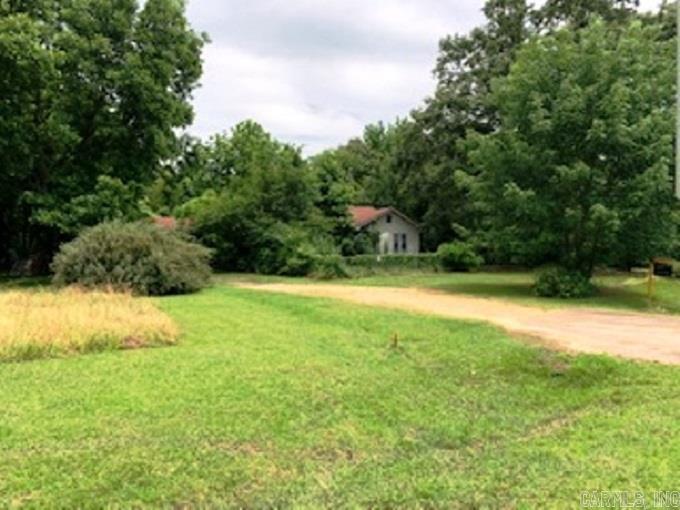 LOCATION IS EVERYTHING. 1.52-acre commercial lot on US 79, at prime, high-traffic intersection in Camden, Arkansas; 1 mile from US Hwy 278 & US Hwy 79 bypass. High school is 1/2 mile away; other schools within 3 miles; hospital/police within 2 miles. 25 minutes from Camden Industrial Park; 30-40 minutes from lithium projects. All mineral rights convey. Square footage, lot size, and acreage is taken from courthouse records.