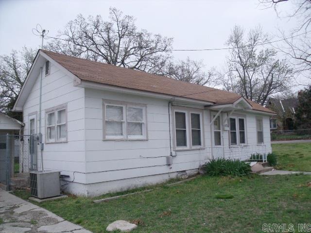 Great rental or first home sitting on large fenced corner lot with detached garage with workshop area. 1 bed 1 bath with open floor plan. Only $49,900