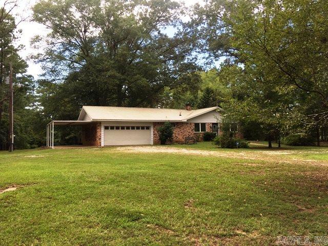 1 MILE FROM LOWER LAKE on Cedar Grove Road is where you'll find this peaceful setting and your next place to call home! Home sits on app. 2+/- acres of land. Den w/fireplace, LR, 3 bedrooms/2 bathrooms upstairs and approximately 1000 ft. in the walk out basement.  Basement has a large living space, another bedroom and bonus area that could be turned into a kitchen and already plumbed for a shower in the bathroom with toilet and sink installed too. Barn is located on back corner of property. SOLD AS IS.