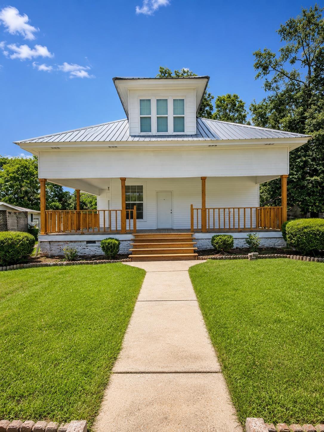 Completely remodeled and full of possibilities, this one-of-a-kind property at 213 S. Smith Ave. offers 3,004 square feet of versatile living space! Featuring 5 bedrooms, 4 bathrooms, and an upstairs media/living room, this property is ideal for investors, multigenerational living, or anyone looking for flexible living arrangements.  Currently configured as a duplex, one unit is already tenant-occupied, providing immediate income potential, while the other unit is ready for an owner-occupant, additional rental income, or Airbnb use. If desired, the property could easily be converted back into one spacious single-family home.  Completely renovated from top to bottom, you’ll love the modern finishes, spacious rooms, and move-in-ready condition throughout. Whether you’re looking to expand your investment portfolio or purchase a home with built-in income potential, this property offers exceptional flexibility and value.  This is a rare opportunity to own a beautifully renovated property with multiple living options and immediate income potential. Schedule your private showing today!
