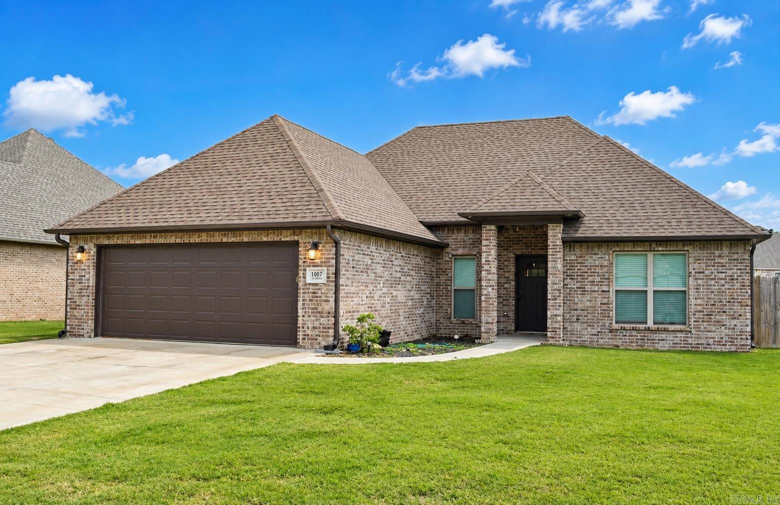 This beautiful home offers an open-concept layout with soaring ceilings, a stunning kitchen featuring granite countertops, custom cabinets, stainless steel appliances, and an oversized island that's made for gathering. The large master bedroom suite is highlighted by raised tray ceilings and plenty of natural light coming through the windows, leading to a gorgeous bathroom with split vanities, a shower, and a freestanding soaker tub perfect for relaxing. Too many other features to mention here, but this house is priced UNDER MARKET VALUE, so don't miss it!