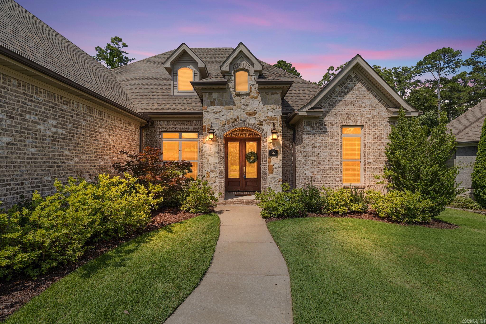 Nestled in a quiet cul-de-sac within Chenal Valley’s prestigious Ensbury Place Addition, this exceptional four-bedroom, four-and-a-half-bath luxury estate perfectly pairs sophisticated elegance with everyday comfort. Inside, an inviting, neutral color palette is beautifully accented by exquisite crown molding, leading you into a gourmet chef’s kitchen complete with stunning custom stone countertops, gas cook top and double ovens. Every bedroom serves as a private sanctuary with its own dedicated bath and walk in closets. The upstairs bedroom can double as a bonus room with full bath. The true showstopper of the home is the magnificent screened-in back porch—overlooking a protected green belt and featuring a cozy fireplace that creates the ultimate year-round retreat for peaceful mornings and unforgettable entertaining. Enjoy all that Chenal Valley has to offer-A private country club and golf course,  The Promenade outdoor shopping mall, Costco, and a variety of restaurant choices just minutes from your doorstep.
