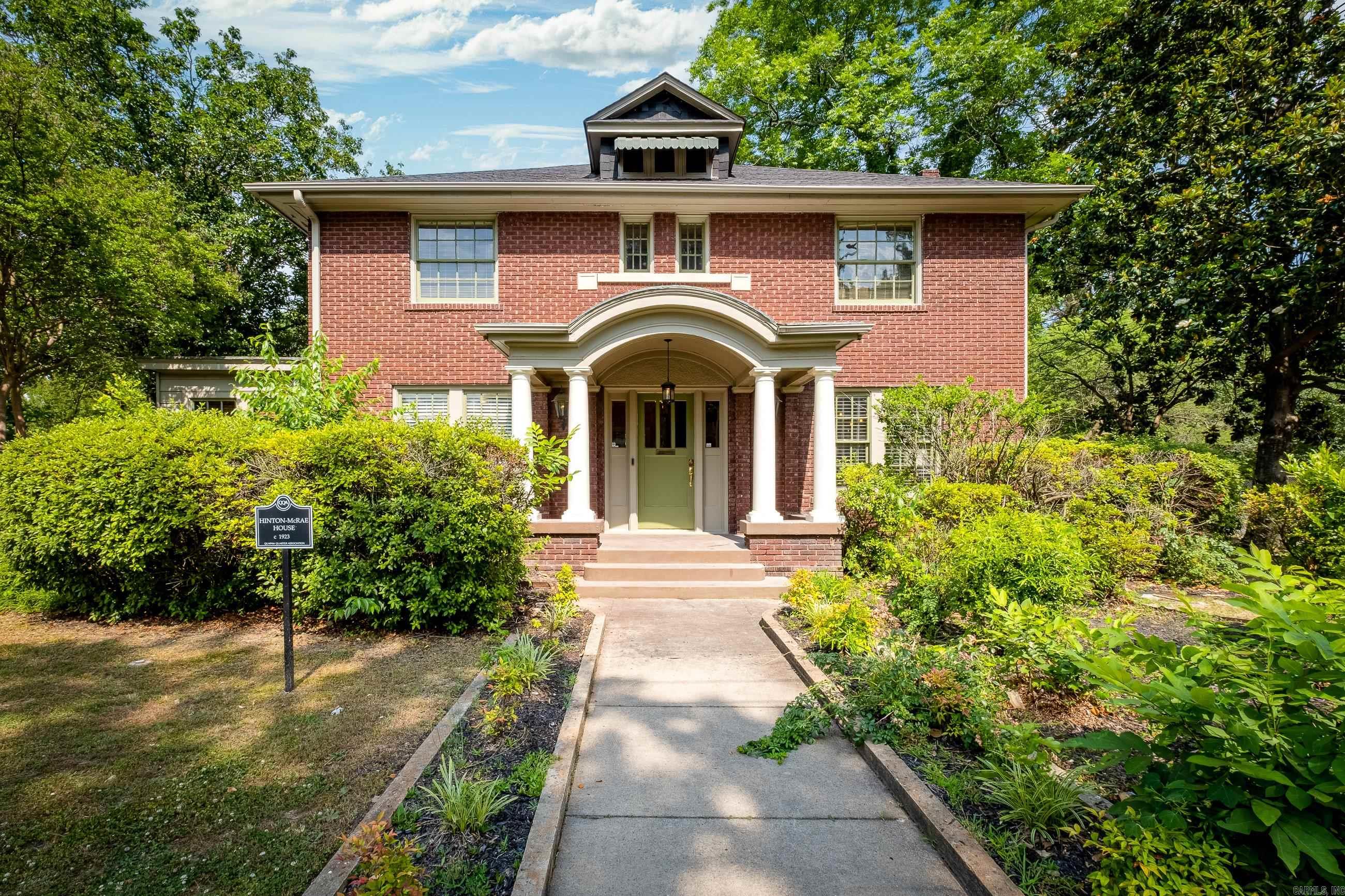 Welcome to The Historic Hinton-McRae House at 1901 Broadway Street. This property includes a 2499 sqft renovated main house and a renovated two story 960 sqft guest house with a spacious open kitchen and living room, a large deck, covered patio, and outdoor storage. The renovated main house can be used as a residence or works beautifully in its current use as an office. A beautiful front porch with gas lanterns welcomes you into the foyer and main hall. Gorgeous hardwood floors, abundant windows and natural light, and intact historic characteristics make this a property you won't want to miss. Adding to the charm is 3 sets of French doors and 2 fireplaces - one in the primary bedroom (conference room). All bedrooms (or offices) are spacious with great size closets for storage. The kitchen has a great size pantry and is conveniently located with a mudroom (and tankless water heater) and backdoor access to the back side gate of the property. There is also additional flexible use space on the main level and a floored walk-up attic. Please inquire for guest house rental information and 3D Tour. This property may qualify for 100% financing. Agents see remarks!