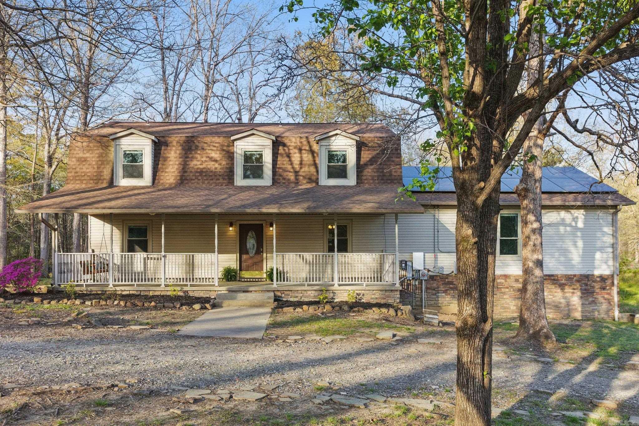 Welcome to this cozy country home, sitting on over an acre of peacefulness. Recently updated with fresh paint and new flooring throughout, this home has a warm, welcoming feel, and move in ready.  Enjoy the country breeze from the screened-in porch or kick back on the deck while taking in the beautiful, open views while BBQing with family and friends. Inside, you'll find 4 cozy bedrooms and 2 full bathrooms upstairs, with a convenient half bath for guests downstairs. The spacious family room is perfect for gathering with friends and family! The kitchen and dining area are combined, also great for entertaining. The large laundry sits right off from the kitchen which makes chores a little easier to maintain while multi-tasking.   For those quiet moments, relax on the porch swing and enjoy your favorite beverage why soaking in the pleasures of country living. This home offers a perfect mix of space, comfort, and that peaceful country vibe. It’s ready for you to move in and make it your own!