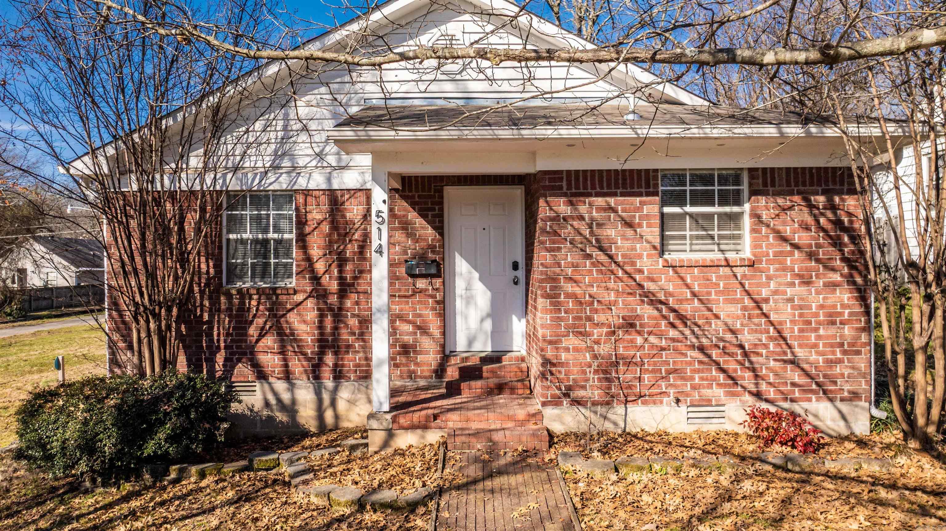 Nestled in the charming and historic Stifft Station neighborhood, this beautifully updated mostly brick exterior 2-bedroom, 2-bathroom home offers both modern convenience and classic appeal. Built in 2003 and thoughtfully renovated in 2022, this home features stunning granite countertops and a stylish tile backsplash in the kitchen, along with a new sink and faucet. Fresh interior and exterior paint enhance the home's inviting atmosphere, while a newly installed gutter system adds to its exterior durability. Conveniently located near UAMS Hospital, shopping, dining, and more, this home also offers a rear parking pad and additional street parking out front. Don't miss this opportunity to own a move-in-ready gem in a prime location!