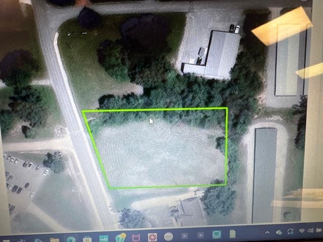 1.1 COMMERCIAL ACRES ON COUNTRY CLUB ROAD!  Located across the road from St. Bernard’s Five Rivers Medical Center.  1.1 acres level building lot. City water and sewer, Summit Natural Gas, Clay County Electric and Clay County Connect Fiber Optic Internet all available. Sidewalk along road. Great spot for a business or medical office!