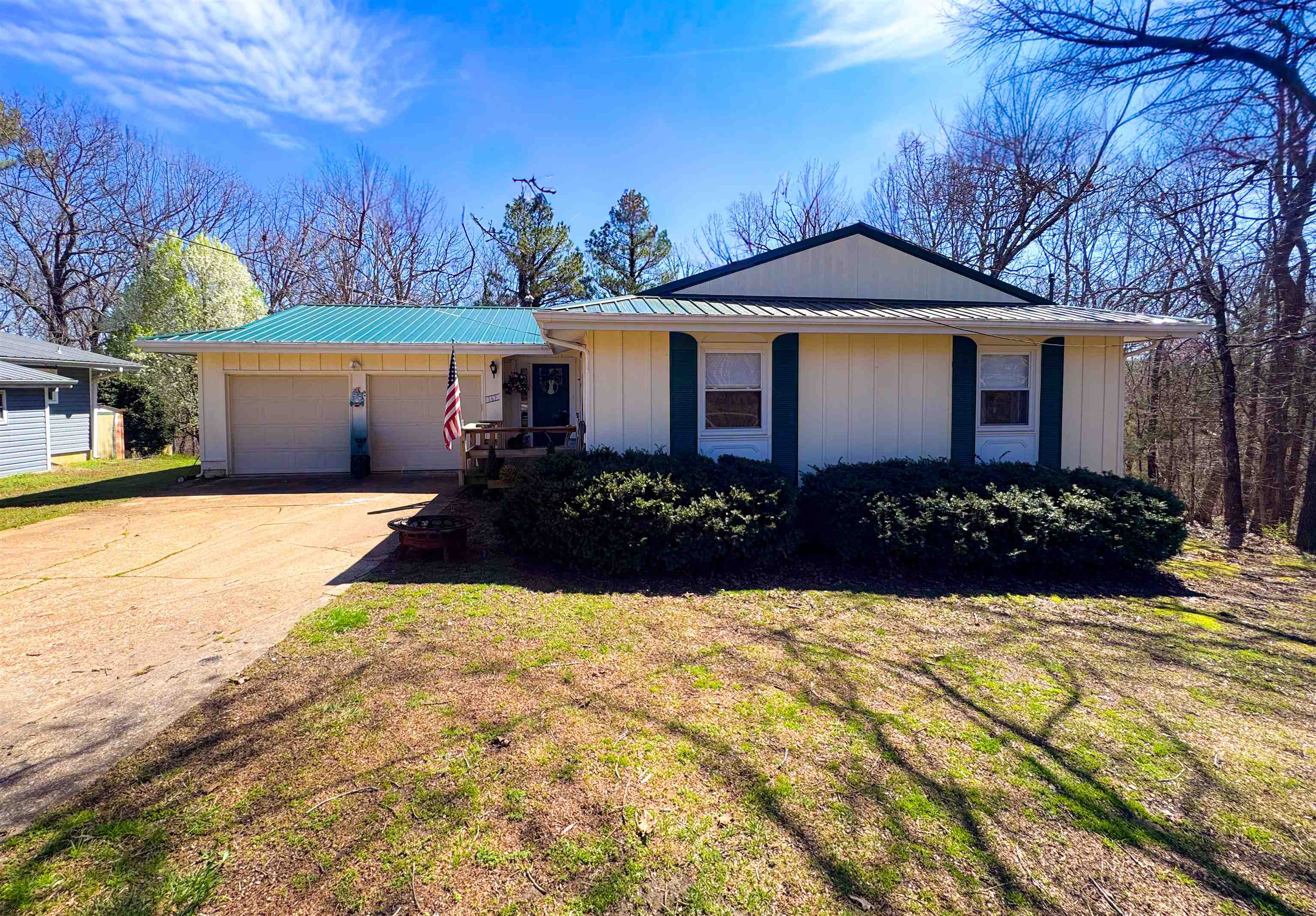 Welcome to 167 Okmulgee Drive in Cherokee Village — a beautifully updated 3-bedroom, 2-bath home with a spacious two-car garage, set along one of the community’s major thoroughfares for quick access to town amenities. Inside, the home feels almost entirely new. Enjoy new flooring, fresh interior paint, fully remodeled bathrooms, a remodeled kitchen, and generous living spaces including a large living room and formal dining room. New doors and trim add a crisp, modern finish throughout. Major improvements provide lasting peace of mind: a new metal roof, new on-demand water heater, new heat pump, and numerous interior upgrades. A screened-in porch overlooks peaceful views and offers the perfect spot to relax year-round. With its blend of convenience, thoughtful updates, and move-in-ready appeal, 167 Okmulgee Drive stands out as an exceptional opportunity in the heart of Cherokee Village. Some furnishings including second fridge, lawnmower, furniture, etc. to be included in the purchase price.