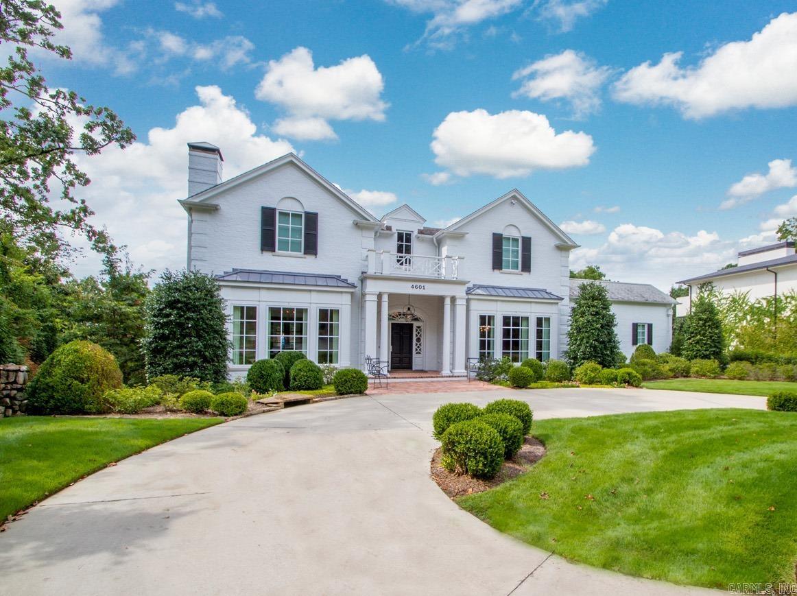 Impeccable quality and design combine to offer the ultimate atmosphere for extraordinary family living and the most fabulous setting for entertaining! This magnificent Heights residence blends classic style with the most exquisite details. Beautiful throughout. Stunning living room that flows into fabulous family room with wall of windows, coffered ceiling and marble fireplace. Gorgeous banquet dining with custom wall covering with butlers pantry and bar. Spectacular primary bedroom on the main level with luxurious bath. Wonderful eat in kitchen with infinity marble island and top quality appliances along with custom cabinetry.  Sunny home office. Three large bedroom suites up. Spacious media/den on lower level. Impeccable landscape with pool. Three car garage along with custom safe room. Elevator to all floors.