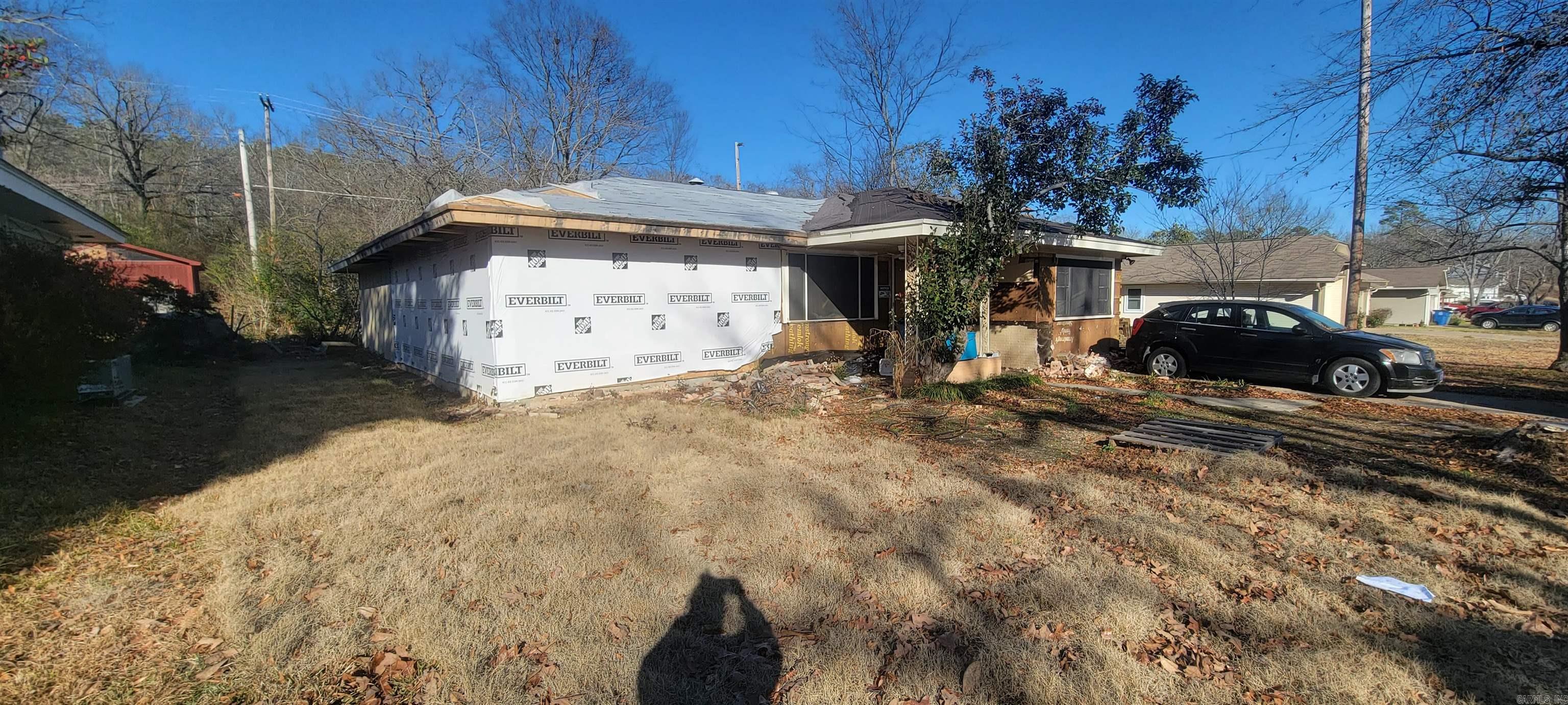 Calling all investors! Don't miss the opportunity to bring this storm damaged home back to life. Conviently located in the Amboy area, less than 5 minutes from I40 and Burns park! Home is currently gutted to studs. Walls/roof structure have been rebuilt. Come see the potential! Square footage based on tax records, measuring is recommended. Agents see remarks.