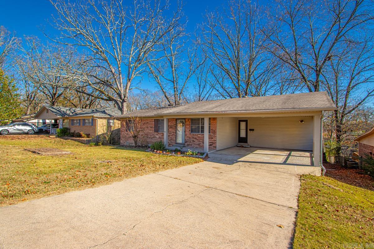 Welcome to 4704 N Cypress Street in North Little Rock! This move-in-ready home features attractive flooring throughout and a completely updated kitchen with modern finishes, ample cabinet space, and a functional layout perfect for everyday living and entertaining. Natural light fills the comfortable living spaces, creating a warm and inviting atmosphere. Step outside to a large backyard with plenty of room for kids, pets, gardening, or outdoor gatherings. Conveniently located near shopping, dining, schools, parks, and major roadways, this home offers both comfort and convenience. Whether you're a first-time buyer, downsizing, or looking for an investment opportunity, this well-maintained property is a must-see. Schedule your showing today!