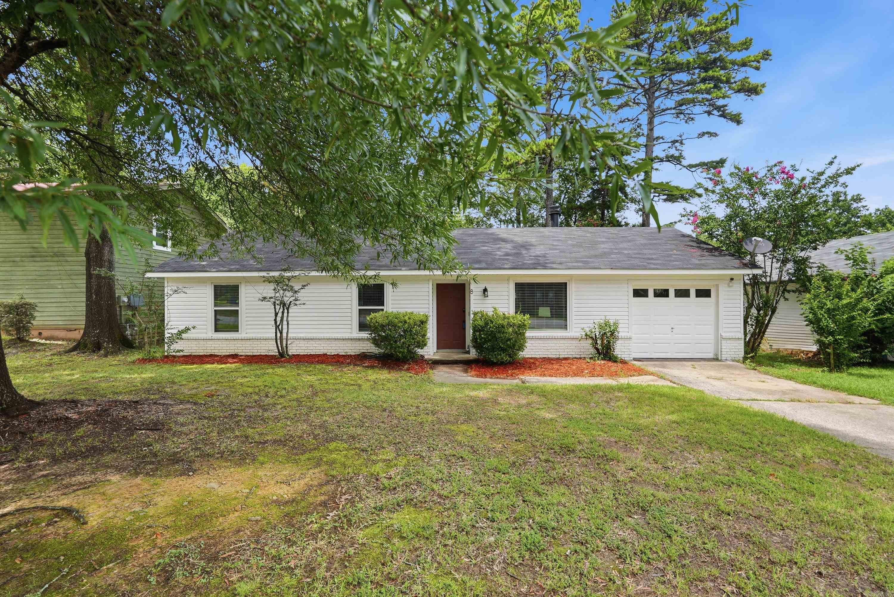 Well-maintained one-level home in the heart of Maumelle. The spacious den features a corner fireplace and is open to the eat-in kitchen, creating a comfortable and functional living space. Recent updates include luxury vinyl wood-look flooring, interior paint, windows, roof, patio door, and an oversized deck. There is a bonus room that could be used as a bedroom, office or any flex space. (currently used as a bedroom) Conveniently located near shopping, restaurants, parks, and schools. Move-in ready and priced under $200,000.