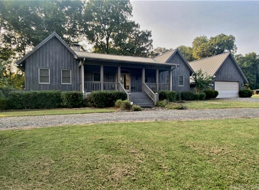 Welcome to your dream riverfront retreat on the picturesque Little Red River! This splendid 3-bedroom, 3-bathroom home is a masterpiece of craftsmanship and design, boasting two cozy fireplaces, creating an inviting ambiance throughout. The open-concept living, dining, and kitchen areas are ideal for both entertaining and relaxation, with stunning views of the river from every angle. Step outside onto the screened porch to savor your morning coffee while soaking in the serene river views and sounds of nature. Crafted with meticulous attention to detail, this home features exquisite touches that elevate its charm. Situated within a beautiful neighborhood, this property is a fishing enthusiast's paradise, with direct access to a shoal that promises excellent angling experiences. Your private boat dock ensures convenient access to the river. Additional features include a detached two-car garage with a tornado shelter, a durable metal roof, and brand new HVAC system. Call to see this home today!