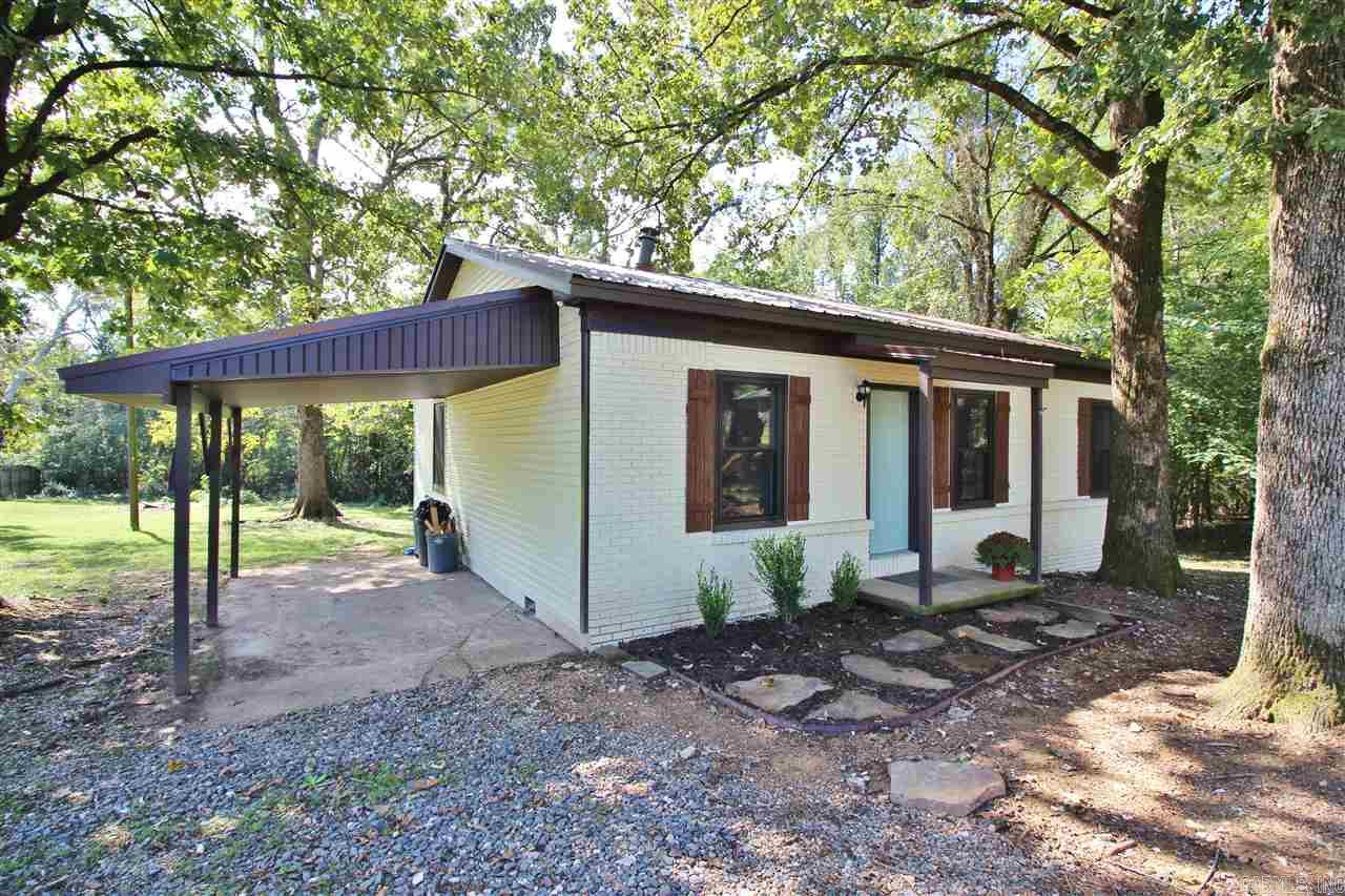 Nicely remodeled house!  Almost everything has been replaced.  Beautiful dark wood floors throughout, granite counters an open floor plan with stainless steal appliances.  Hall bath has a newly tiled shower.  The new deck has built in seating and is great for entertaining.  Never worry about replacing your roof, it's metal!  Exterior has been repainted, new siding and shutters have been added to increase the charm of this home!  Great house to start your family or to downsize too. Qualifies for RD Loan.