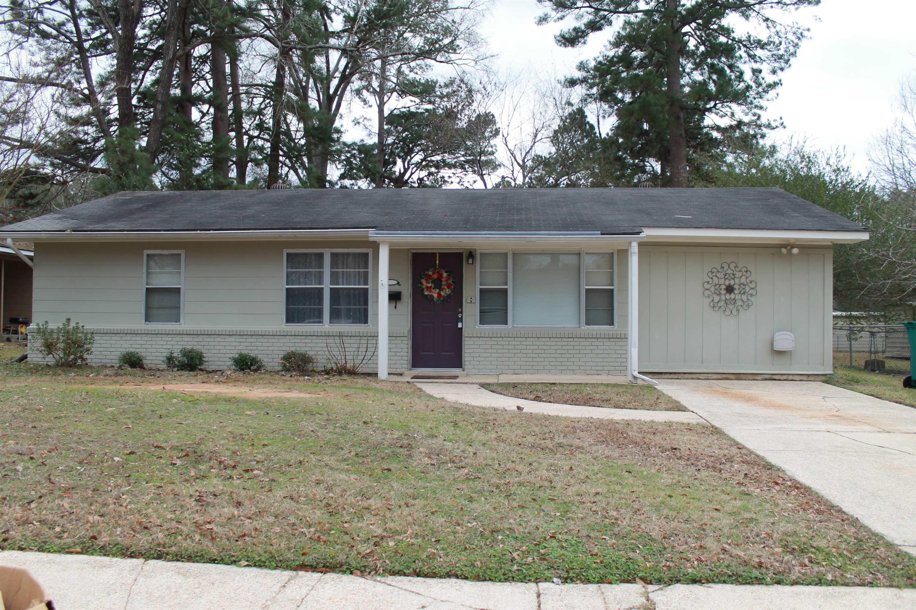 Fenced back yard; storage or man cave in back; storm windows;