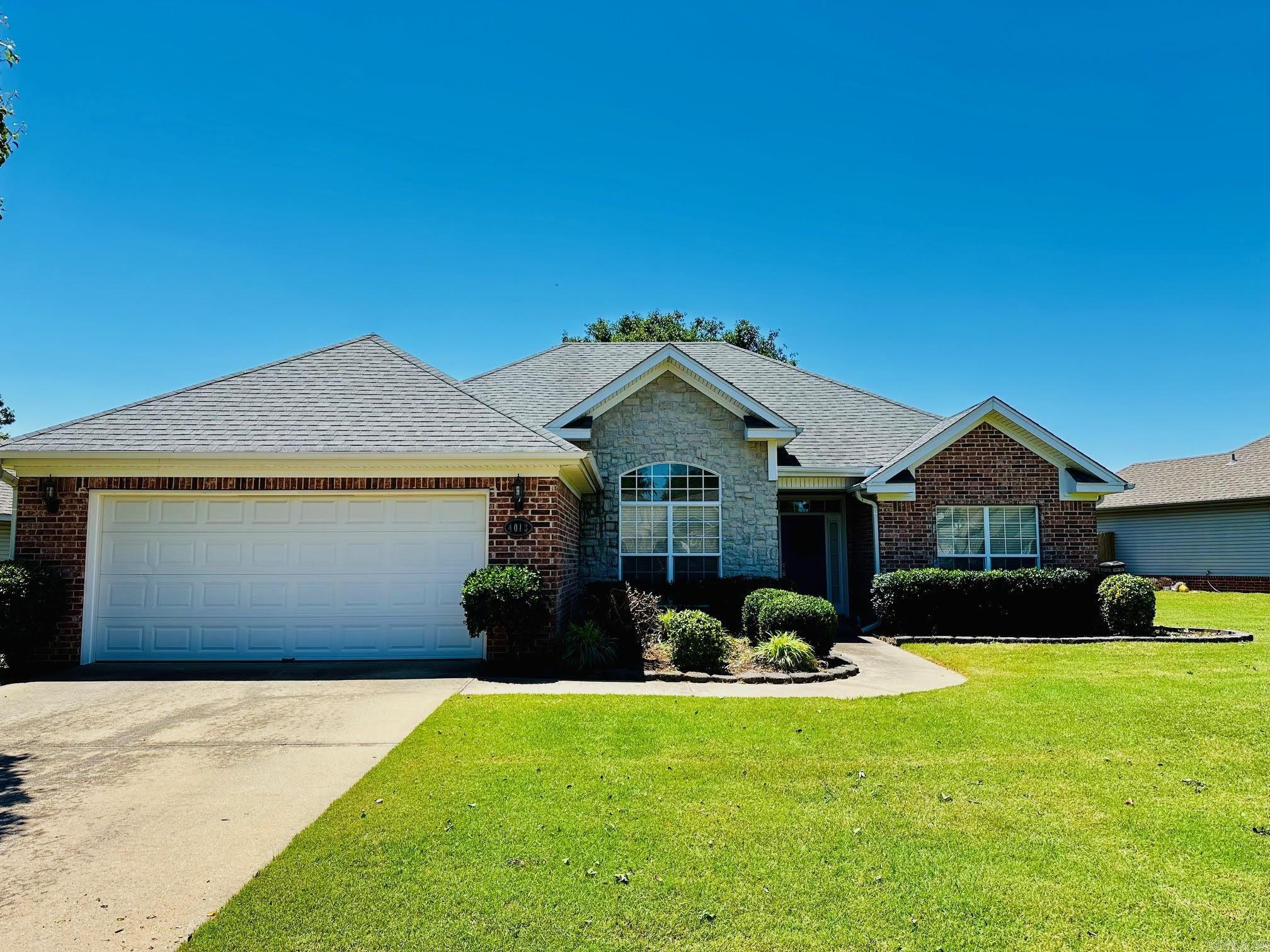 Located in the popular Heritage Farm subdivision in Benton, this well-maintained 3-bedroom, 2-bath home offers a desirable split floor plan designed for comfortable everyday living. The inviting living area features a cozy gas-log fireplace, while the spacious layout provides both functionality and style. Step outside to enjoy the covered patio overlooking the fully fenced backyard — perfect for relaxing, entertaining, or pets. A storage building adds extra space for tools, hobbies, or seasonal items. Conveniently located close to Interstate 30, schools, shopping, dining, and everything Benton has to offer, this home combines neighborhood amenities with easy access to nearby conveniences.