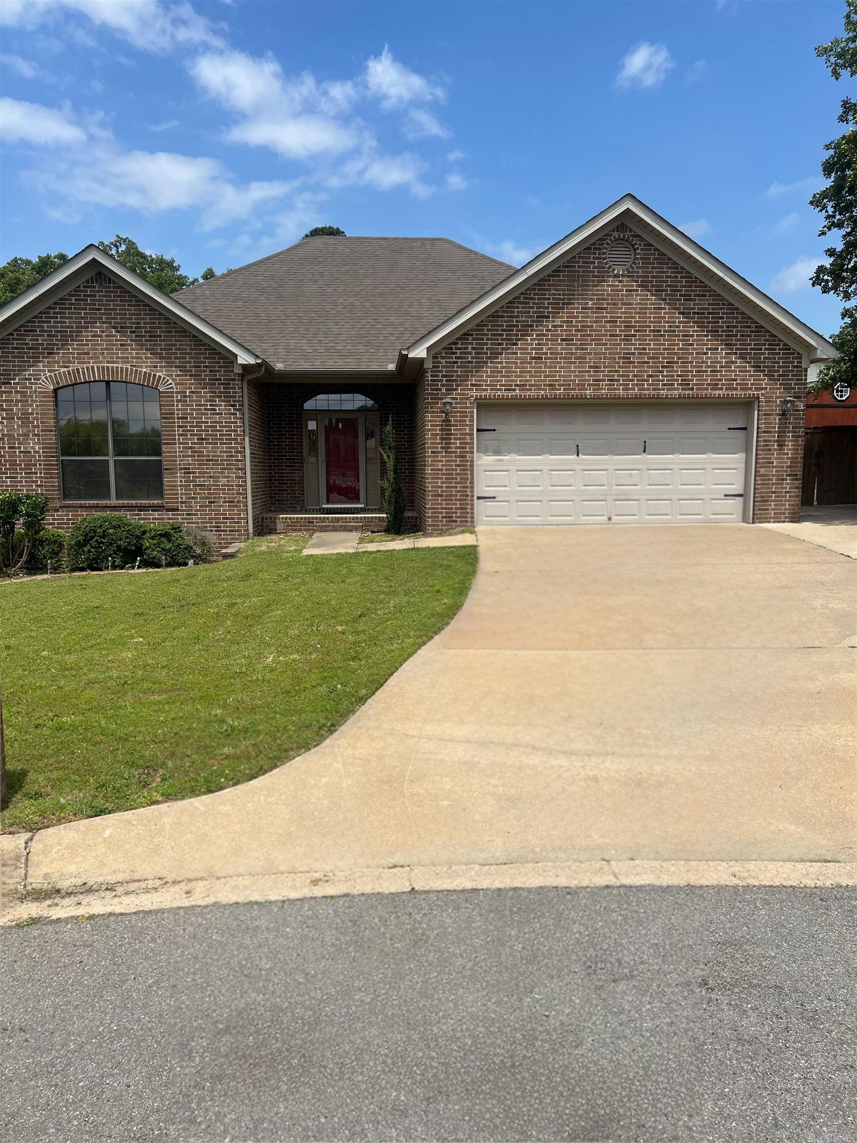 This one level brick home has a lot of character and amenities! Located in a quiet level cul-de-sac, with plenty lot space and parking. The home is an open concept with living, dining, and kitchen with laminate hardwood floors in the main living area. Master is separate from the 2 beds plus an office/den with its own private door to the backyard. The back door opens to a covered patio and fence that were done in 2023. The level yard has a finished 12x20 Urethane side lofted barn with heated & cooled space with its own private deck and a 10X14 storage building. Must see this home!!