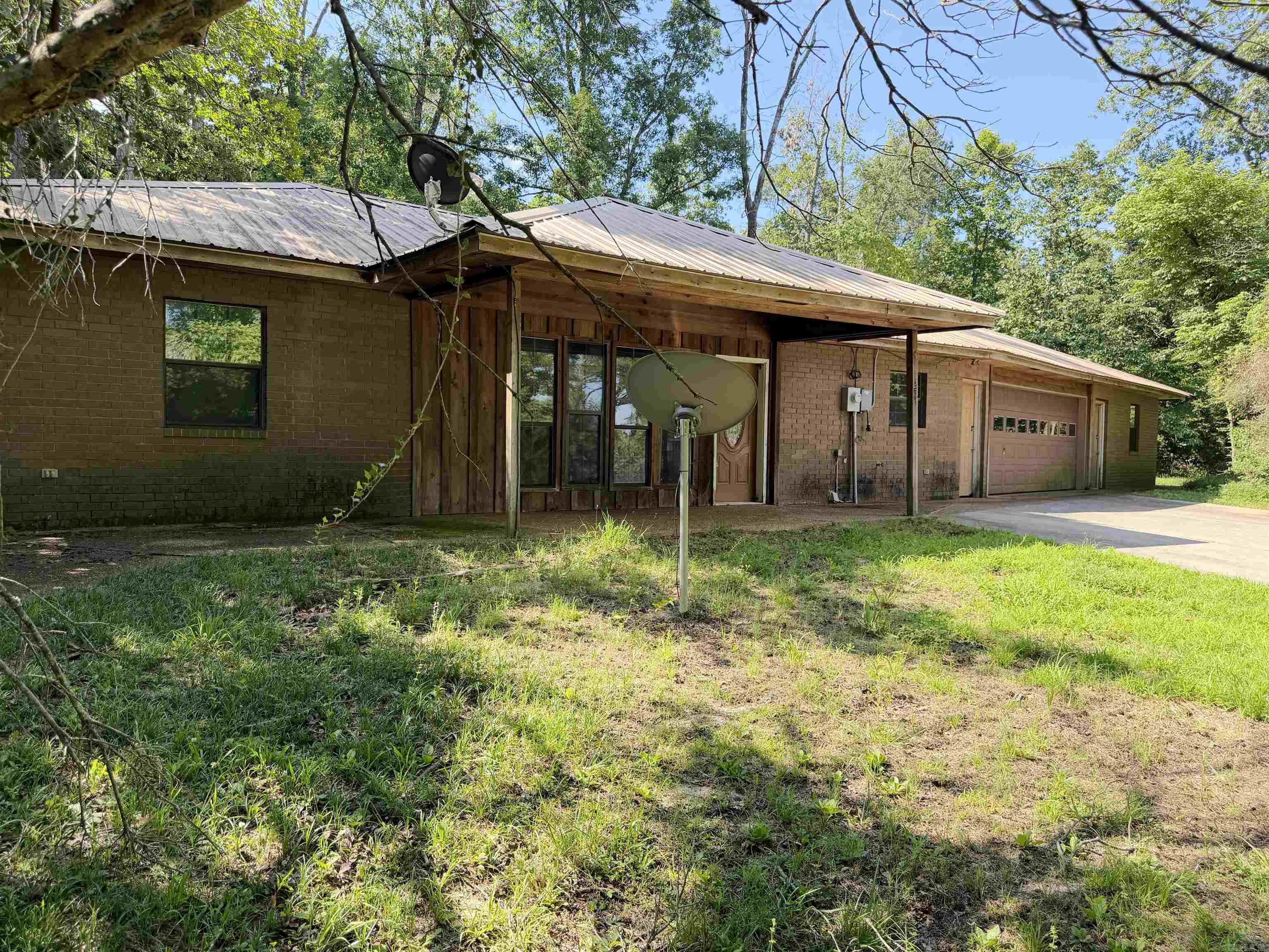 Check out this home that is sitting high and mighty. It is waiting for you to come make it your own. Featuring three bedrooms, attached garage, fireplace in the living room and plenty of mature trees. Buyer to verify all information on property. Call today to schedule a look!