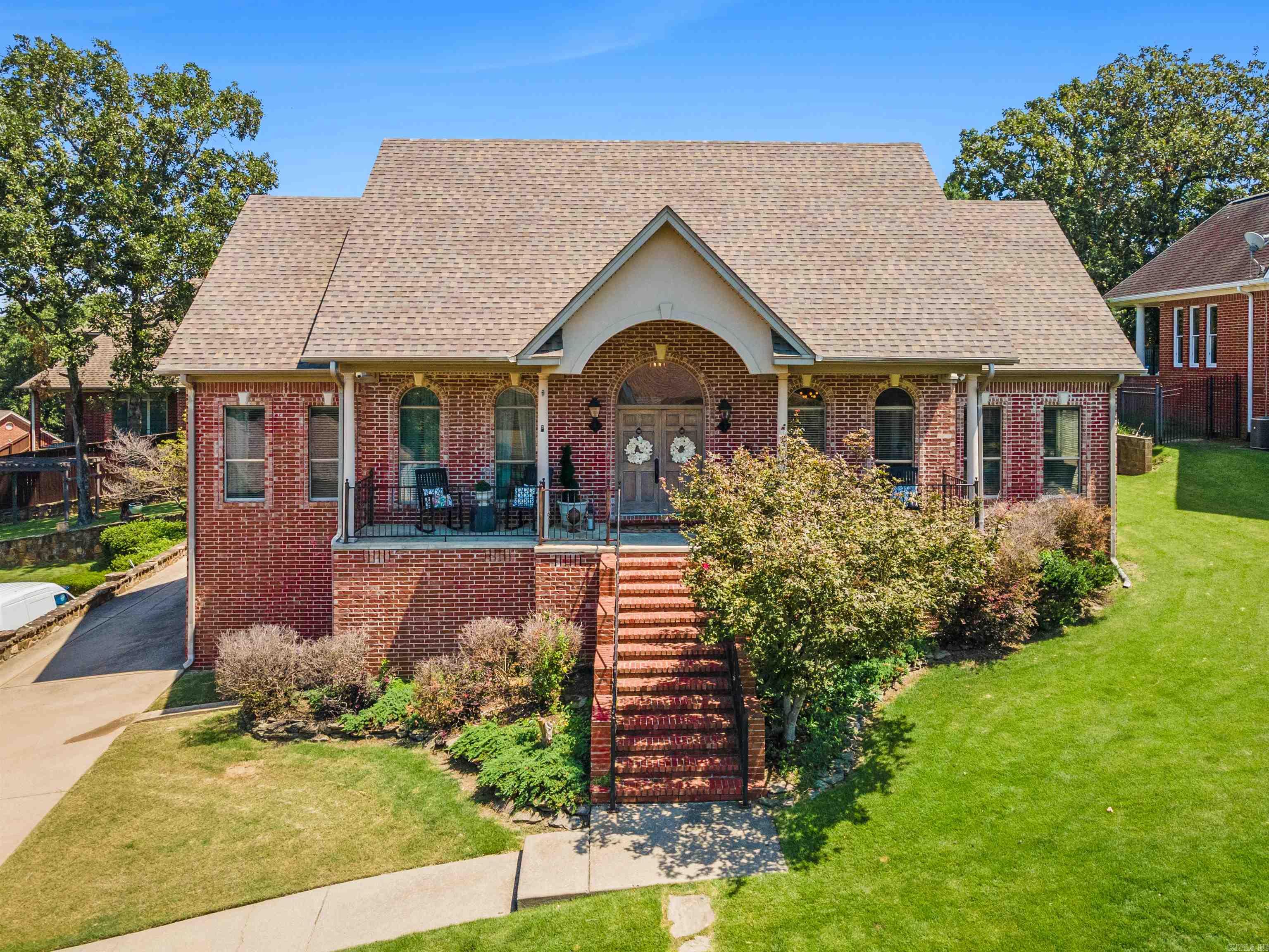 This incredible home has so many custom features!  The large front porch greets you as soon as you get there!  Perfect for enjoying the sunsets!  As you walk in you will enjoy the open floor plan allowing for all the entertaining and fun!  Extra high ceiling gives way to a balcony area and stainless steel appliances in the kitchen.  The main level has two guest bedrooms and a fully remodeled bathroom.  The primary suite is also on the main level with a separate office overlooking the backyard pool and deck area.  The primary bathroom is a total dream! Think NYC with a walk-around closet to include lights for your shoes!  There is also a laundry and 1/2 bath on the main floor.  Upstairs boasts of a super spacious game room, tons of storage, a large full size bathroom (again, remodeled to the 9's!) and a nice guest room.  There is a plethora of storage under the house!  The backyard and the lovely pool are perfect for these hot summer days!  There is a firepit to enjoy crisp nights as we transition to fall!  Please see attached documents for the extra features I don't have room to type in! You can basically manage this home with your smart phone! SEE AGENT REMARKS!
