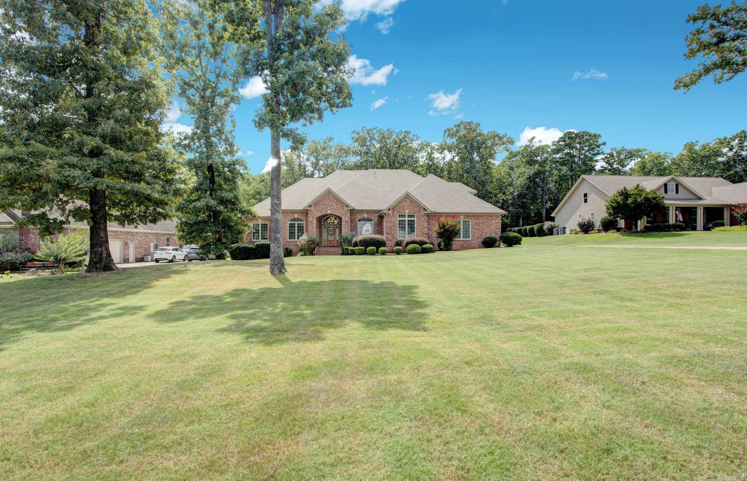 Welcome to 7015 Lucea Road, a spacious custom-built home offering 5 bedrooms, 4.5 baths and over 5,400 square feet of living space on approximately one acre in gated Callaghan Creek. From the impressive entry and soaring ceilings to the generous living and entertaining spaces, this home offers a layout designed for both everyday living and special gatherings. The kitchen features granite countertops, custom wood cabinetry, a breakfast bar and double ovens, opening to comfortable living areas highlighted by a gas fireplace. The main level offers multiple bedrooms, while upstairs provides a private office and additional flex space ideal for work, gaming or hobbies. One of the home's most unique features is the indoor half-court basketball court—an incredible space that could also serve as a home gym, recreation area, entertainment space or other creative use. Additional features include zoned HVAC, a 3-car garage and plenty of room inside and out. With its combination of space, versatility and distinctive amenities, 7015 Lucea Road is ready for its next owner!