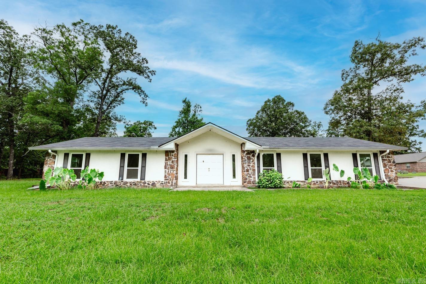 Escape to the peaceful setting of 130 Timber Lane, where this 3-bedroom, 2-bath home sits on just under an acre, offering the space and tranquility you've been searching for. Inside, you'll find a comfortable layout with a huge flex room that can easily serve as a second living area, home office, playroom, gym, or hobby space. Outside, the expansive yard provides plenty of room for gardening, entertaining, pets, or simply enjoying the quiet surroundings. If you're looking for a home that combines flexible living space with the charm of country living, this property is one you won't want to miss. Agents, please see remarks for offer submission.