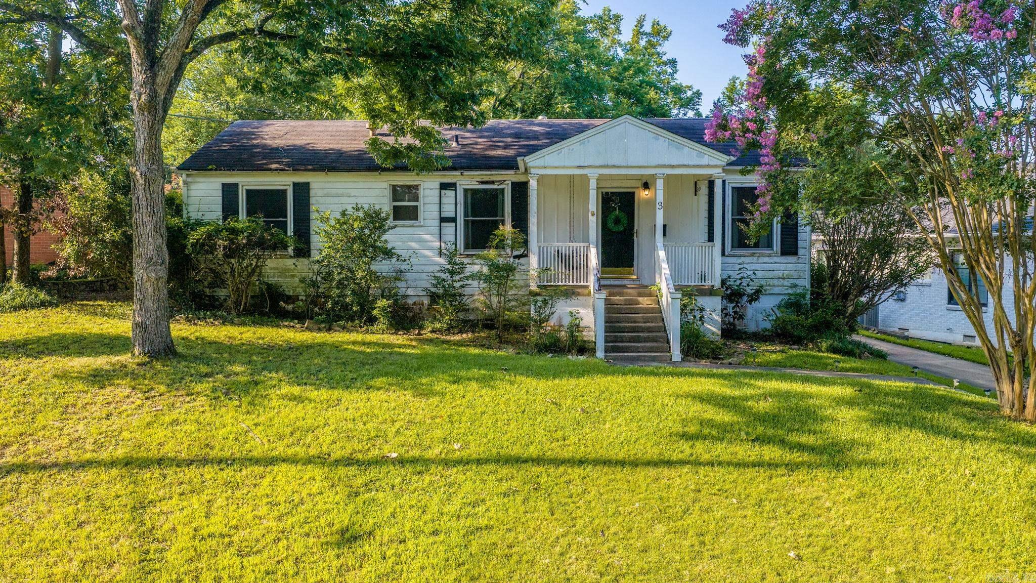 This charming 1950s bungalow is ready for a new owner with an exciting vision!  Timeless hardwood floors through the living room and bedrooms offer just a glimpse of the character here.  Whether you're looking to restore its charm, expand the footprint or start fresh with a brand new home, the property is full of opportunity and endless possibilities.  Tucked in Kingwood, it sits on a lot with a gentle slope in the front and levels out nicely, creating a wonderful setting for whatever comes next. Sold as-is. Agents, see remarks.