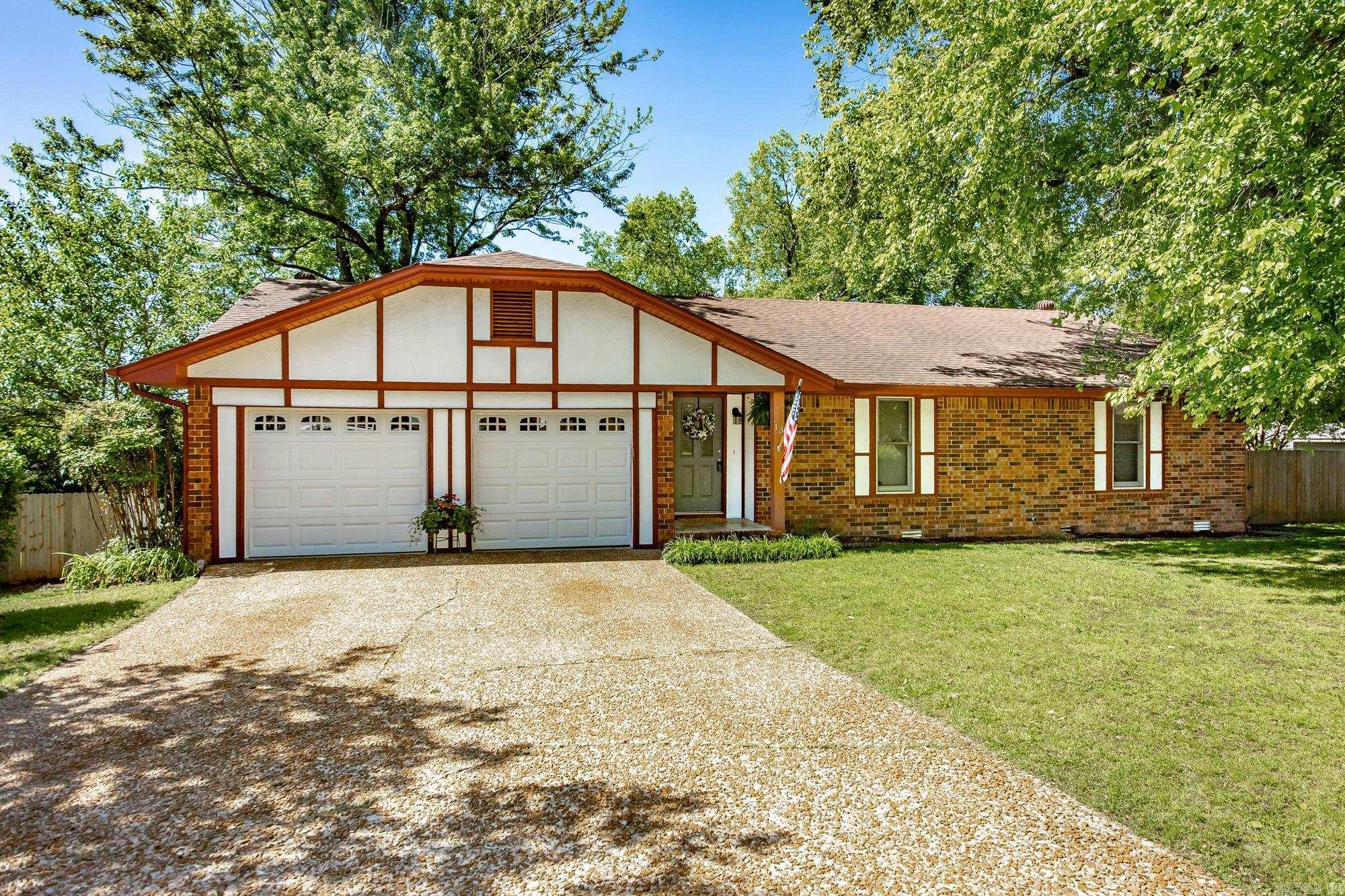 Located in a prime neighborhood, this beautiful 1988 sq ft, 3/2 home offers accessibility to all of Searcy amenities.  Spacious living areas include a bonus room and living area, both with fireplaces. If you are needing a 4th bedroom the bonus room could be a possibility.   Additional features include a spacious craft room/office and large kitchen ideal for entertaining.  An expansive deck off of the kitchen provides a shaded area for relaxation and socializing.  The oversized lot offers flexibility and tranquility.  Further development potential lies in finishing the basement, adding valuable square footage. Arrange a showing today to experience this property.