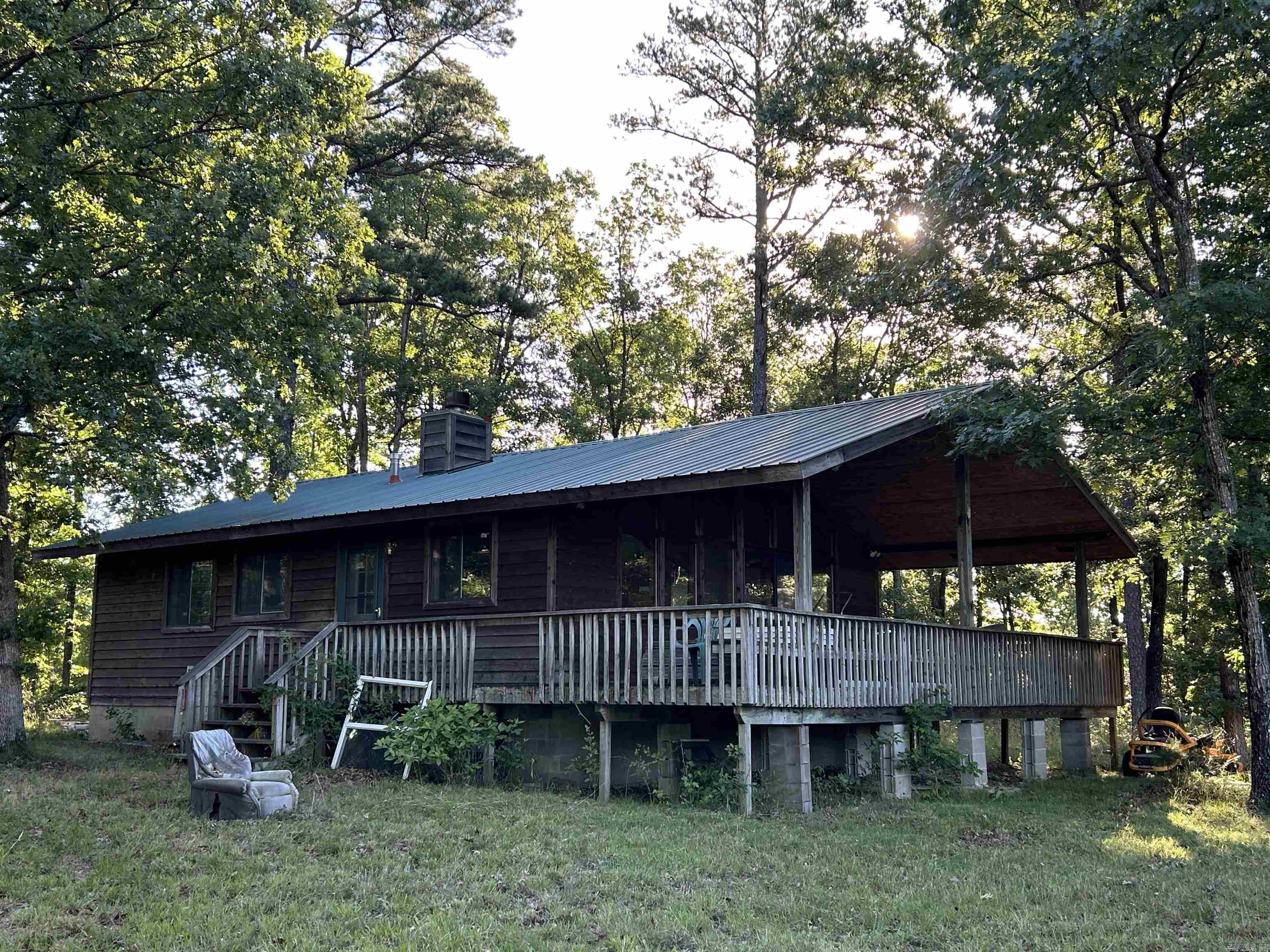 120 Acres of Ultimate Off-Grid Freedom –One of the Last True Remote Sanctuaries. Escape the chaos of modern life and technology on this truly remote 120-acre property. With 4-wheel drive access only, it offers unmatched seclusion and privacy in a vanishing wilderness. This one-of-a-kind gem features a custom-built 1.5 acre stocked fish pond, multiple natural springs for reliable fresh water, a generator-powered off-grid cabin as your basecamp, and over an acre dedicated to gardening for self-sufficiency. Unrestricted acreage means no rules – build more structures, homestead, hunt, farm, or create your perfect prepper retreat.  Multiple mature tree species surround you making ideal for preppers seeking security, off-grid enthusiasts craving independence, and those wanting to disconnect completely from the grid. Water security, food production, and total freedom await on this last-of-its-kind sanctuary – your opportunity to own true wilderness and live life on your terms. PreQualified buyers only. Schedule your private tour today!