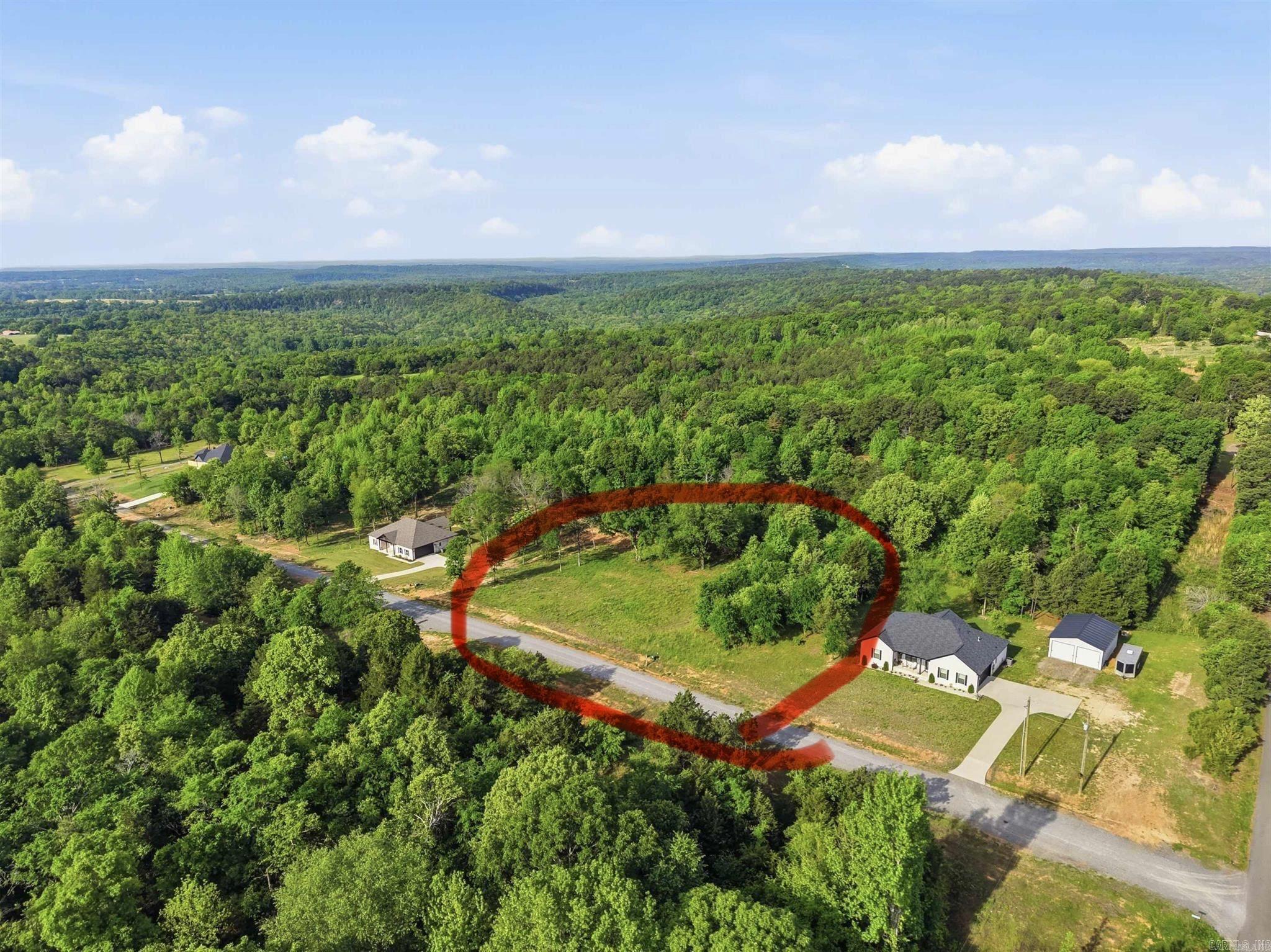 This acre was subdivided and sold off from a larger parcel (778-10989-000). Twin Groves. Faulkner County, AR. Underground utilities on site. This was a nearly ready-to-build lot. Just needed some dirt work and some small trees and shrubs cleared.