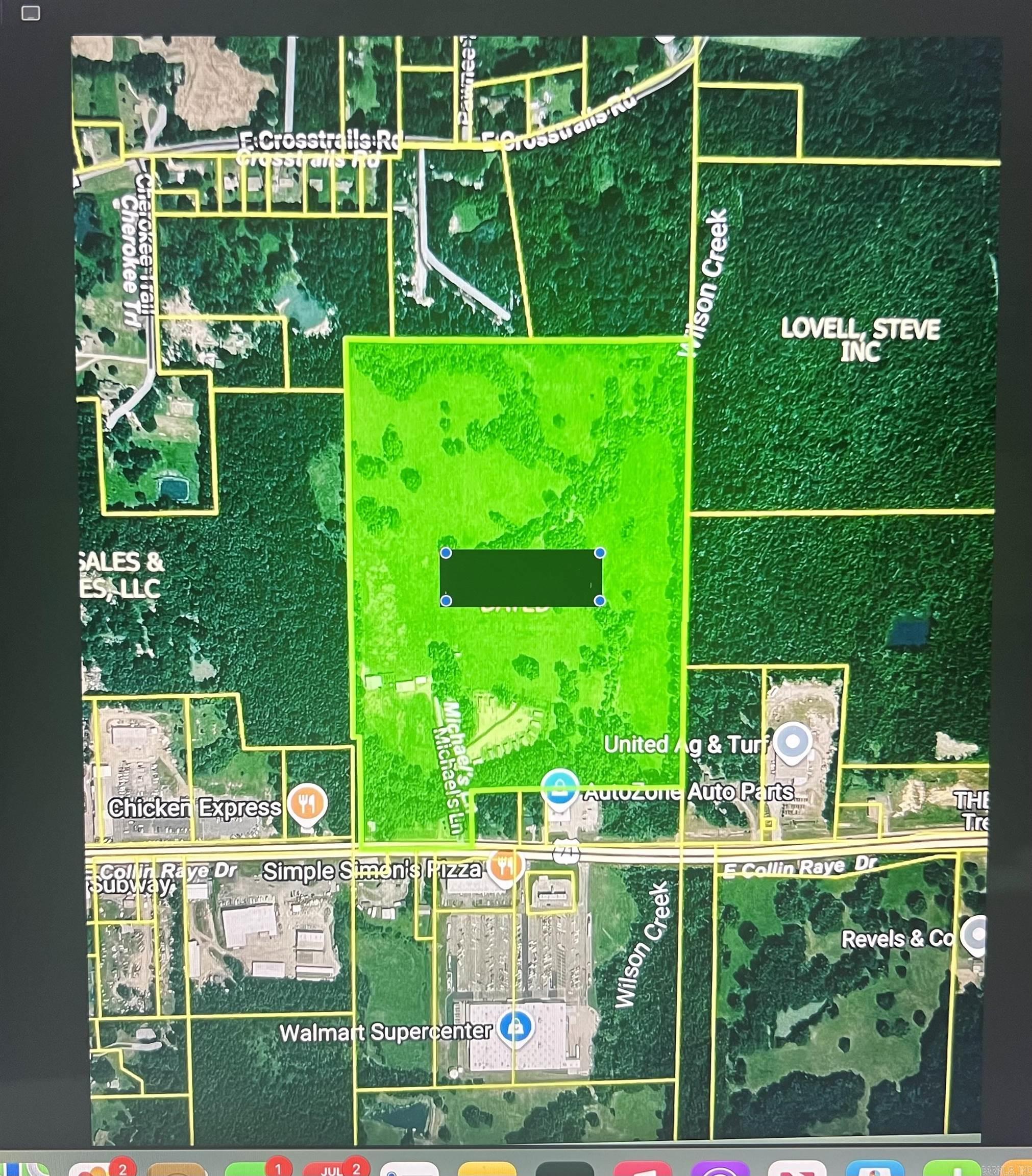 Exceptional 55 acres+/- Investment & Development Opportunity !! Rare opportunity to Own approx. 55 acres in a prime location directly across from Walmart with high traffic exposure in DeQueen Arkansas. Approx 13 acres are commercially zoned, offering outstanding possibilities for retail, hospitality, RV Park, or future development. Commercial portion includes 13 income-producing rental cabins, all currently occupied, along with two homes and one mobile home on the property that is tenant-owned.These properties have city sewer and water, all electric.  One large shop ,one pole shed. Remaining property is pastureland with cattle grazing.