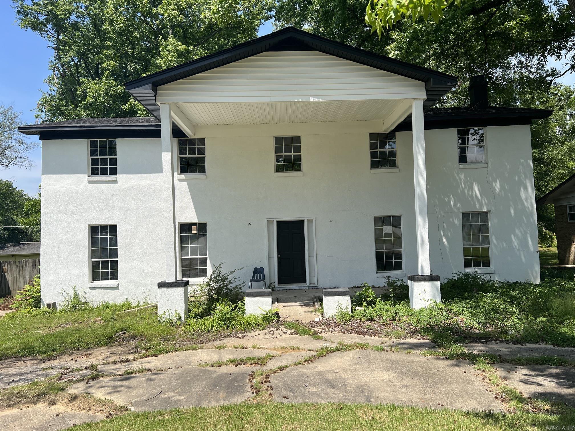 Large House Ready for Renovation. House is gutted down to the studs.  Investor Special cash or bank loan financing.  4 bedroom 3 baths Storage/garage area in back yard