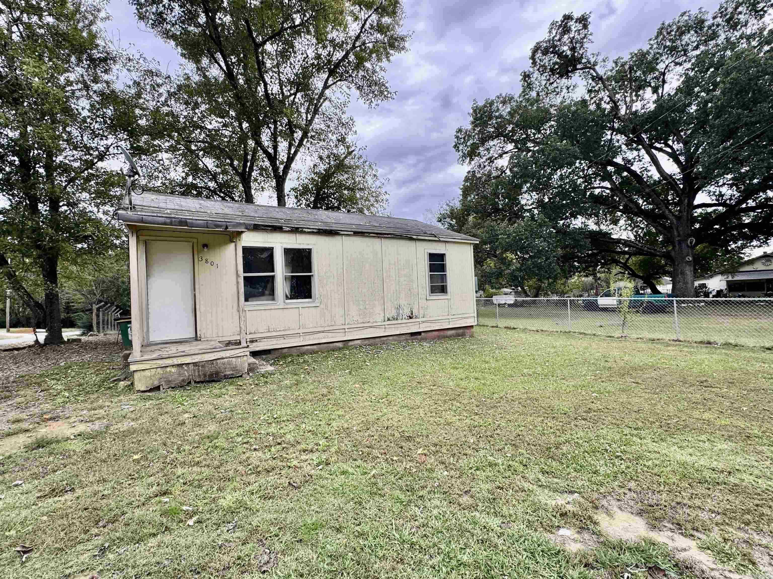 Great Investor opportunity. This 2 bedroom, 1 bath home is ready to be rehabbed. This property is being sold "as is" with no seller property disclosure. Storage building. The property line goes back further than what's fenced in. Agent see showing remarks.