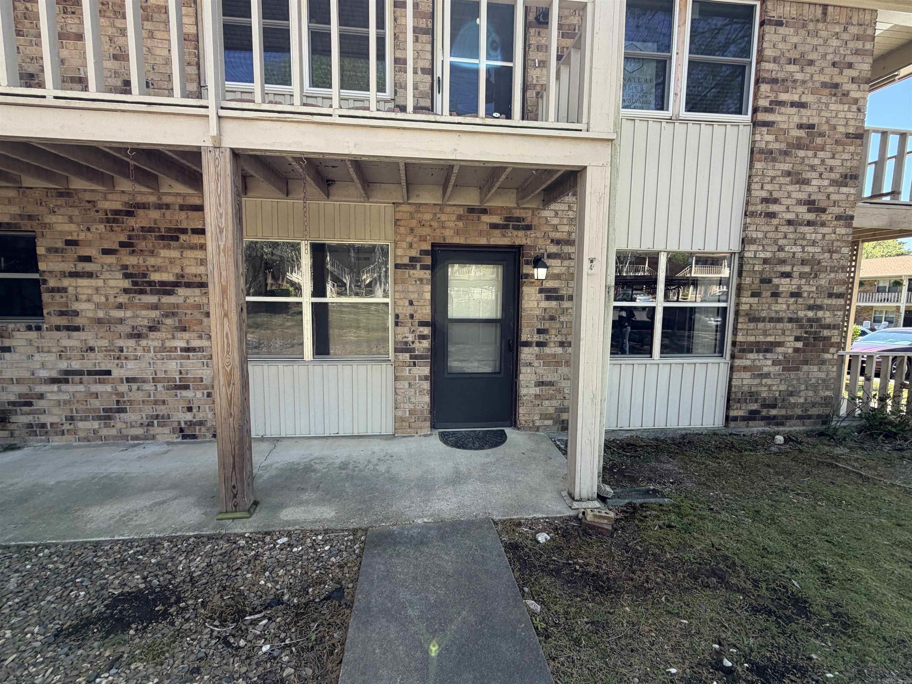UPDATED ground floor (NO STAIRS!) 2 bed 2 bath condo with patio and dedicated covered parking. NEW paint, SS appliances, flooring, LED lights & fans, granite counters, shower tile, faucets. Woodburning fireplace with glass doors, easy access to covered patio with extra storage. Centrally located to shopping, easy to get on bypass. Swimming pool. HOA fee covers trash, parking area, grounds, termite, exterior maintenance & exterior insurance. SEE AGENT REMARKS for showing info. *Previous buyer got transferred, had nothing to do with the property*