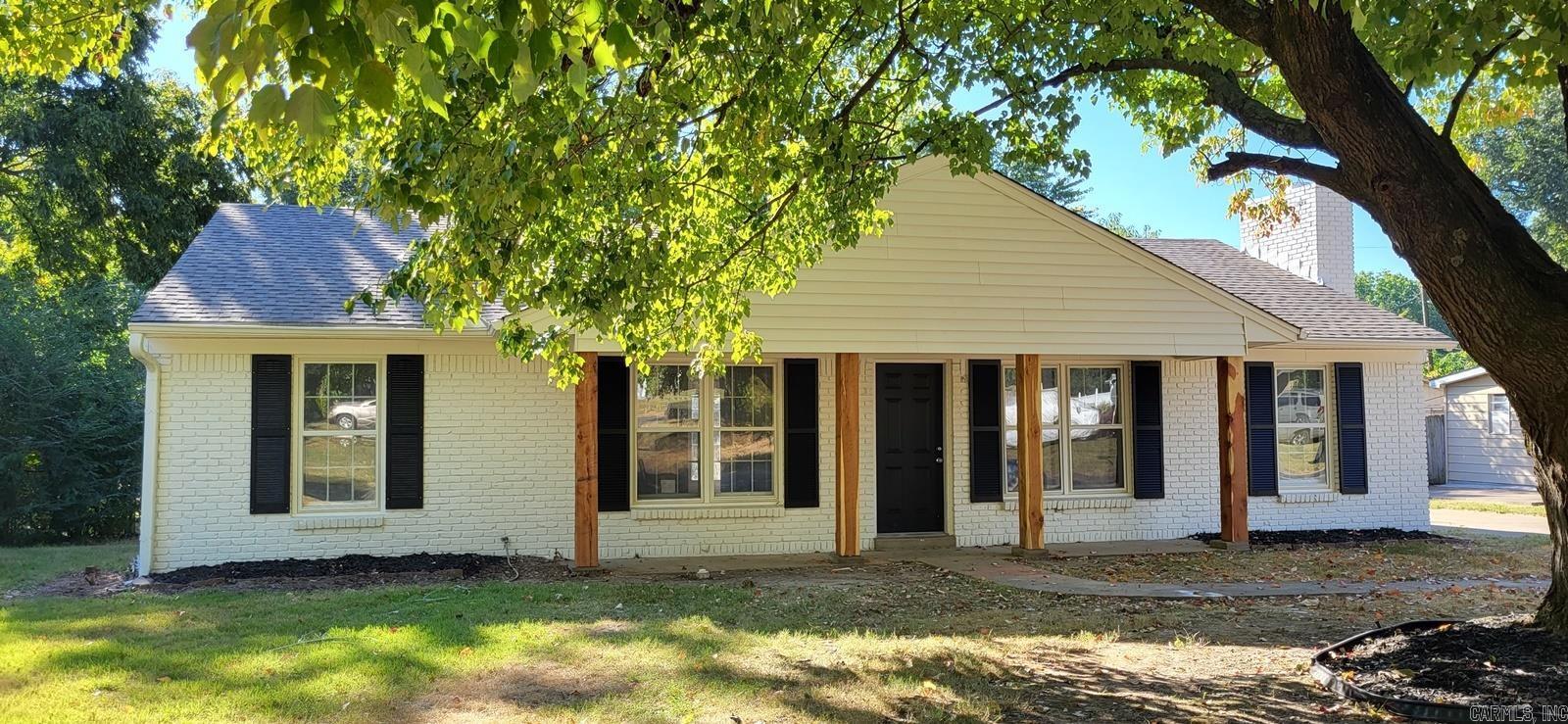 Beautifully renovated and move-in ready! This charming 3-bedroom, 2-bath home offers great curb appeal and is an excellent choice for first-time homebuyers, investors, or anyone looking for a home that's ready to enjoy. The large living room features a cozy fireplace and brand new flooring. The kitchen features painted cabinetry and is complemented by two dining areas for added flexibility. The primary suite includes an en suite bath. A convenient laundry room adds to the home's functionality. Recent improvements include interior and exterior paint, updated front columns, a beautifully refreshed fireplace, and painted kitchen cabinetry that give the home a modern feel. Major system updates completed in 2019 include the roof, ceramic tile flooring, and HVAC system, offering added value and peace of mind. This home is one you won't want to miss. Schedule your private showing today!