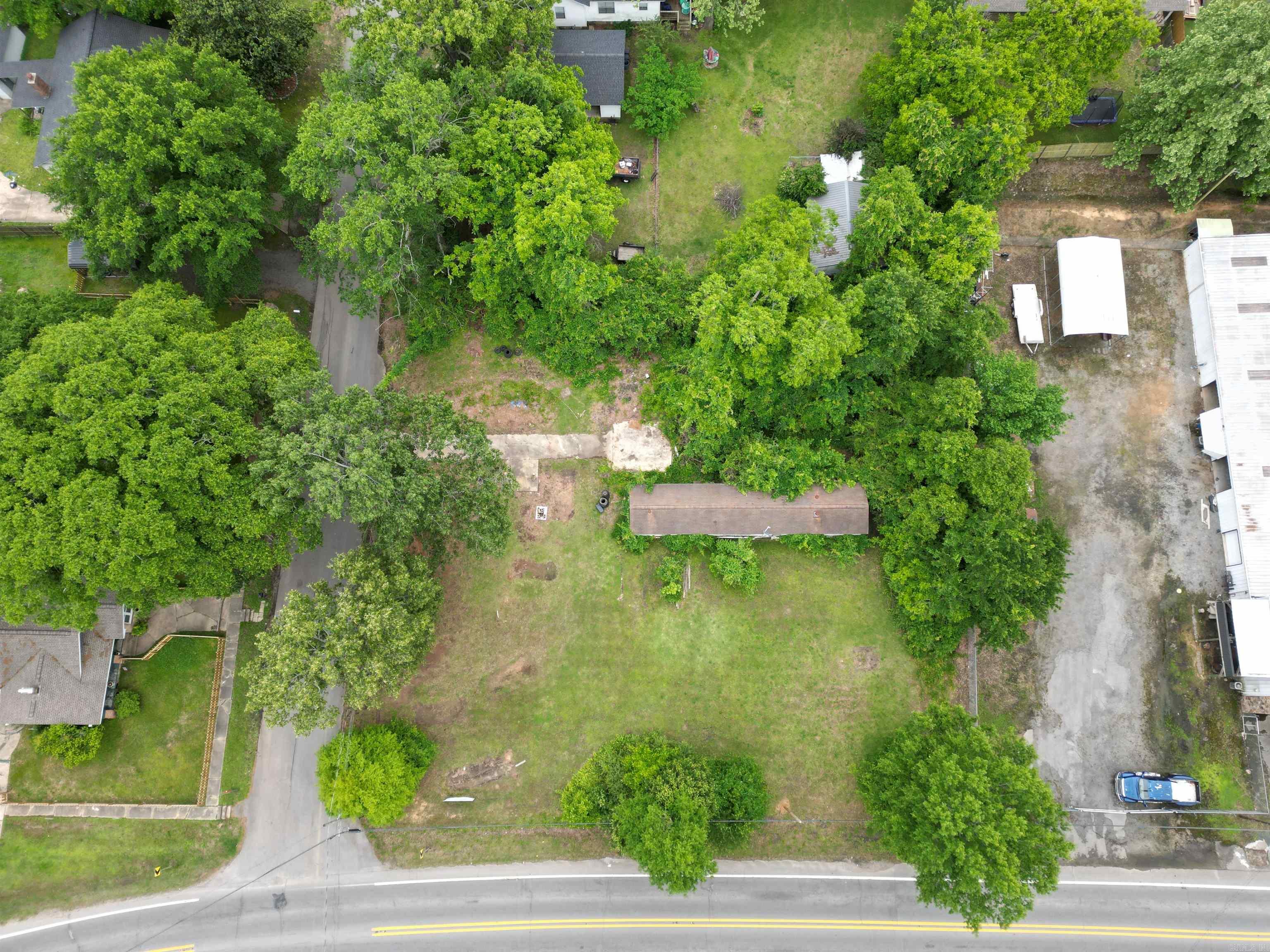 Position your business for success with this prime commercial development opportunity in the heart of Sheridan. Located along the highly traveled Hwy 270 corridor, this 0.52-acre site offers exceptional visibility, accessibility, and flexibility—making it ideal for a wide range of commercial uses.  With 150 feet of highway frontage and dual access points from both Hwy 270 and Cumberland Street, this property is designed for convenience for customers and clients. The site features a desirable 150’ x 150’ layout, utilities available, and flexible commercial zoning, ready to bring your vision to life.  Strategically positioned just one block from downtown Sheridan, this location benefits from consistent daily traffic counts exceeding 10,000 vehicles, strong surrounding business presence, and high exposure for signage and branding.  Now available for sale, this is a rare opportunity to secure a high-visibility commerical site in one of Sheridan's most active growth corridors.