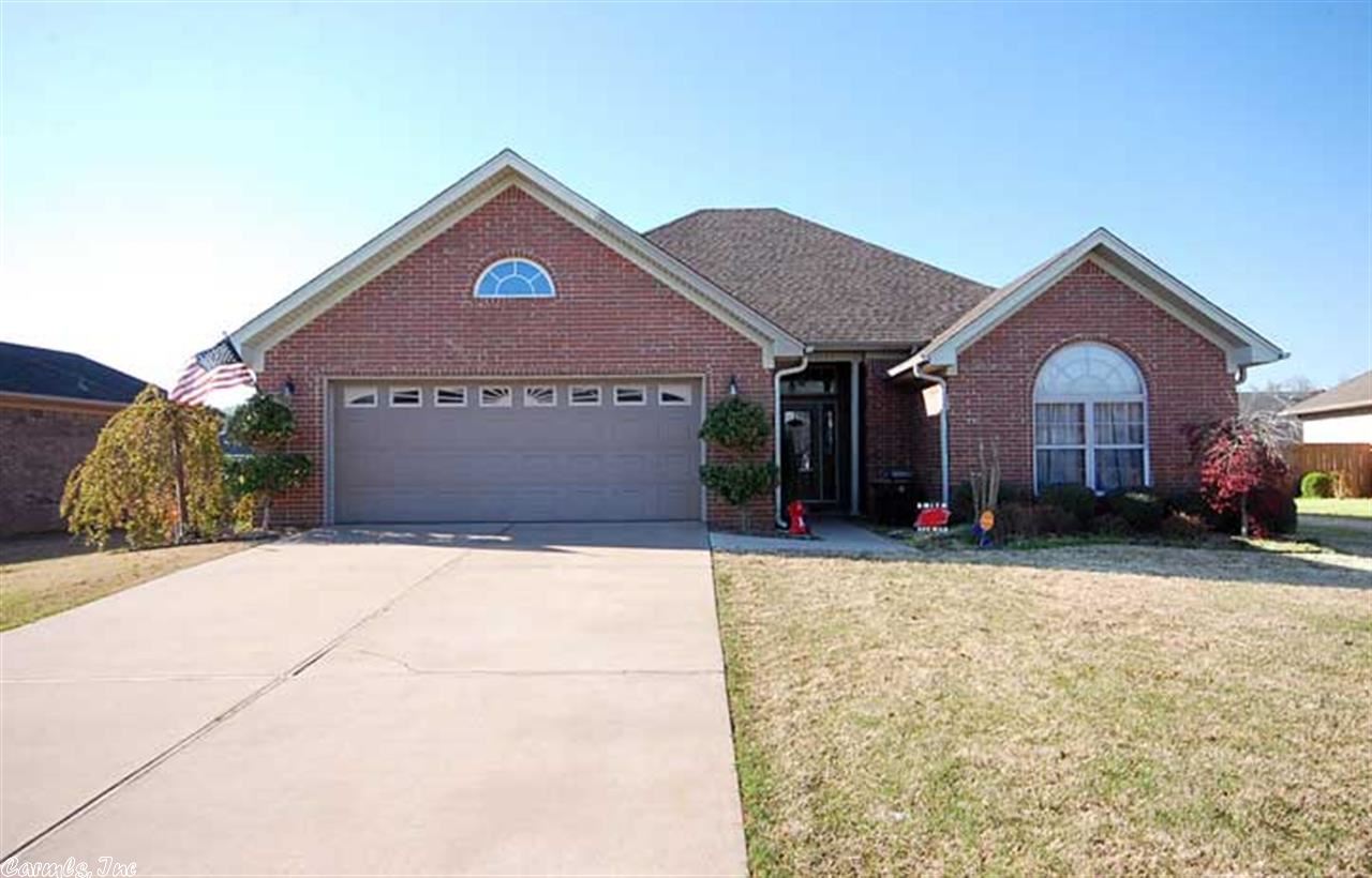 This fabulous all brick 3 bedroom 2 bath house is perfect for your family! Huge living room w/ a pan ceiling. Second living room or Razorback man cave! Giant Maser bedroom w/ a fire place and decorative ceiling. The master bath has a jetted tub, double vanities, his and her closets, private potty, and separate shower. Both extra bedrooms are big. The kitchen has an awesome back splash, stainless appliances, breakfast bar and area for a large family table. The fully fenced back yard has a great deck.