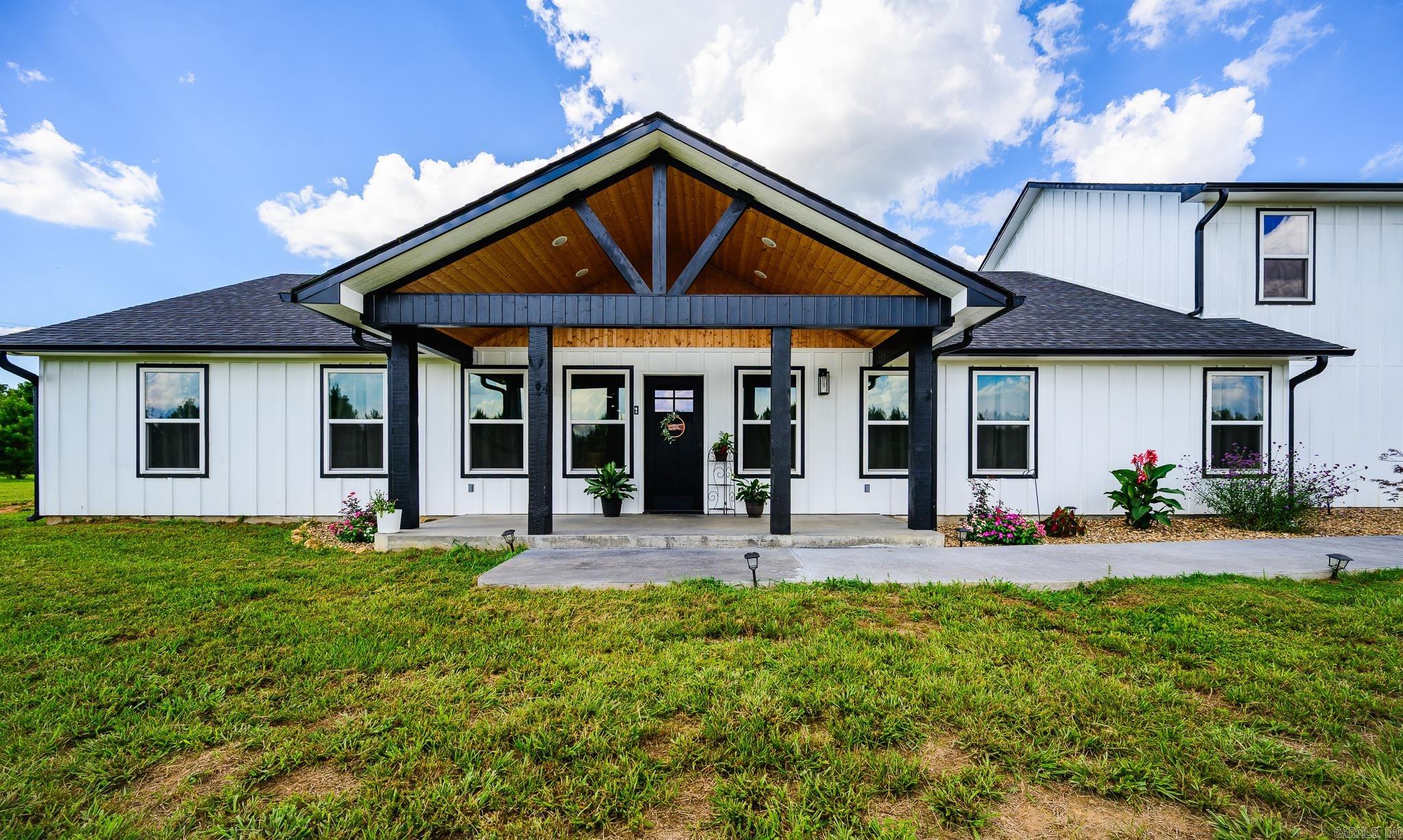 Tucked away on 3.01 private acres in the Ouachita Mountains, this brand new 2025 custom home is unlike anything else on the market in Mena. From the moment you walk in, the quality and attention to detail are immediately apparent. Quartz countertops, custom cabinetry, smart appliances, and an open concept floor plan create a living space that is as functional as it is beautiful.  Four generous bedrooms and 2.5 baths provide plenty of room for the whole family, while a dedicated upstairs media room adds a fun and flexible bonus space you didn’t know you needed. Cement plank siding keeps maintenance low and curb appeal high, and smart home technology throughout means this home is truly built for the way people live today.  Three acres of private land gives you the breathing room and peace and quiet that is increasingly hard to find, while still being just minutes from town. Whether you are raising a family, working from home, or simply ready to stop compromising on space and quality, this property delivers on every front.  New construction. Custom finishes. Private acreage. This one is worth a look!