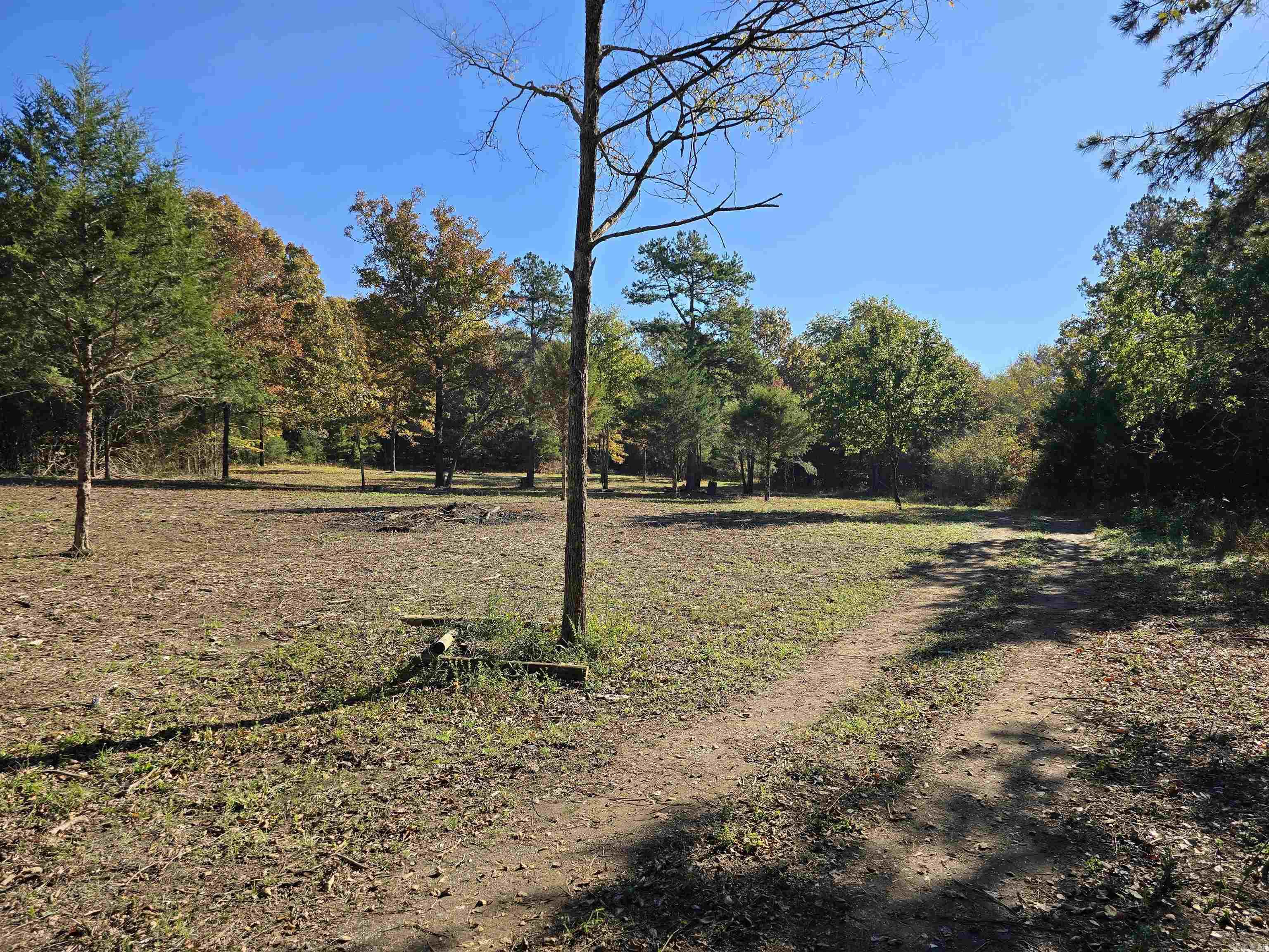 Discover this exceptional 16-acre parcel of vacant land, offering the perfect blend of cleared space and serene woods. Fantastic for Hunting! Approximately 2 acres are already cleared, with the remaining acreage beautifully wooded, ensuring privacy and natural beauty. There is also a Beautiful RV that will remain with the Property!  This property is truly ready for your dream home or cabin, boasting essential infrastructure already in place: New Well Pump, New Septic Tank, Electrical service, and a RV that is hooked-up ready for you!  A desirable building site is waiting for your vision! Enjoy the tranquility of a small creek that runs along the back boundary of the property.  Located conveniently near Iron Mountain, this is an outstanding opportunity for those seeking a weekend getaway or a permanent nature-filled residence or a place to hunt with all the hard work of utility installation already done!  Don't miss this rare, fully-equipped piece of paradise!