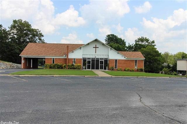 Great location!  This property is currently home to a church but could be developed to suit as value is mainly in the land.  With nearly 2 acres of land the possibilities are limitless.
