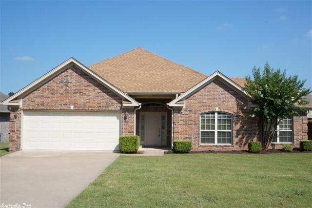 Great home in a great neighborhood.  Open floor plan with high ceilings.  The fireplace has a wonderful large mantel that can be used for decoration or for your t.v. There are hardwood floors in the great room and living area.  The kitchen has stainless appliances, including a fridge that will stay and tons of cabinets. House has been totally repainted, new carpet through out and freshly cleaned.  It is move-in ready.