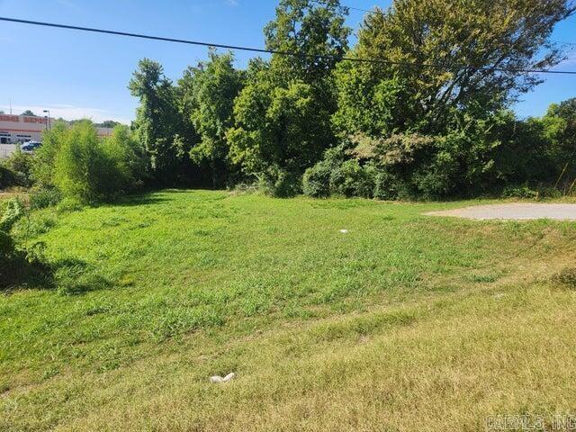 One of the last commercial lots on Harrison St is ready for a new project. Conveniently located next to Home Depot and close to Walmart, this 1.15 ac m/l lot offers high trafic and great visibility.