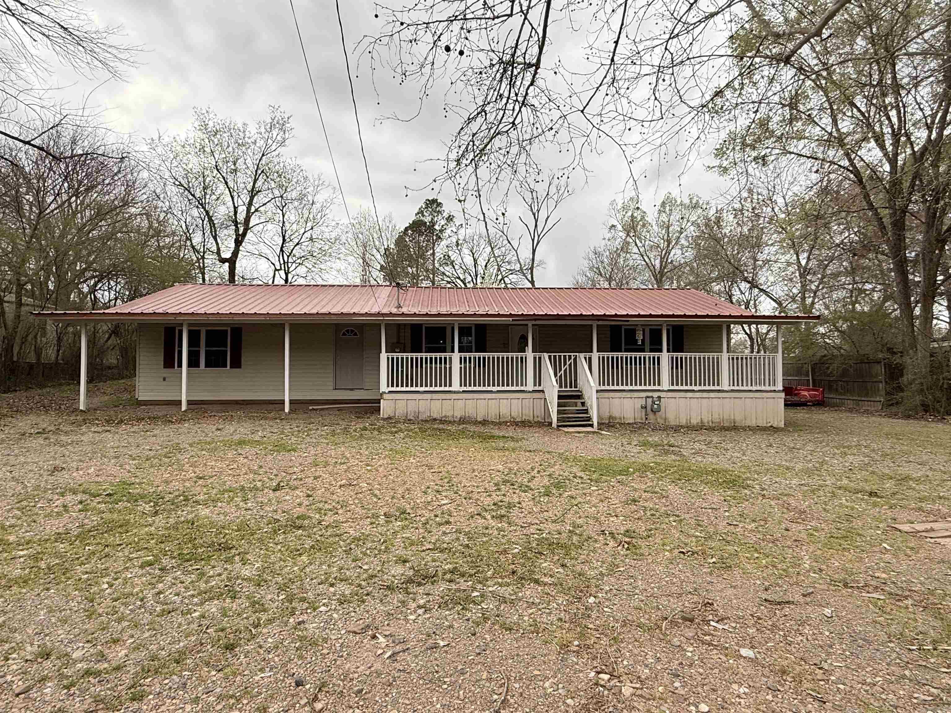 Located in the heart of Glenwood just minutes from the scenic Caddo River, this spacious 4-bedroom, 1.5-bath home offers approximately 2,080 sq. ft. of versatile living space. Making it a prime opportunity for investors or first-time buyers. The interior features a desirable open-concept floor plan that creates a seamless flow throughout the home. Outside, the property has a fully fenced front and backyard, complete with extra storage. Situated in an established area near local shopping and dining, this home is ready for its new owners to start their next chapter.