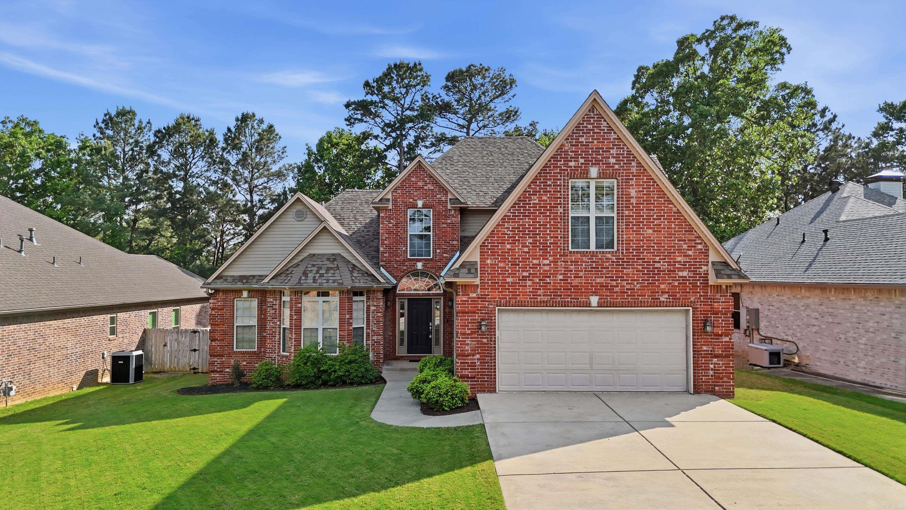 Discover this stunning home in Maumelle’s desirable Waterside neighborhood, just one block from Lake Willastein. Boasting excellent curb appeal and a spacious, versatile floor plan, this property is perfect for everyday living. A grand entry welcomes you to a bright office with a bay window, along with an inviting living room featuring a cozy fireplace. The kitchen offers ample storage, a generous eat-in space, plus a flexible area ideal for formal dining or hobbies. The main level also includes a half bath and a laundry room with a sink. The oversized primary suite is a true retreat, highlighted by a recently updated  bath with tiled shower, jetted tub, dual vanities, and walk-in closet. Upstairs, you’ll find a bedroom with private en suite bath, two additional bedrooms connected by a Jack-and-Jill bath, and a spacious loft perfect for relaxing or entertaining. Step outside to enjoy the fenced backyard from your private deck. Major updates include a roof (2020), HVAC (2023), dishwasher (2024), and water heater. Plus a brand new deck added in 2025! You won't want to miss out, schedule your showing today! *Photos have been virtually staged.