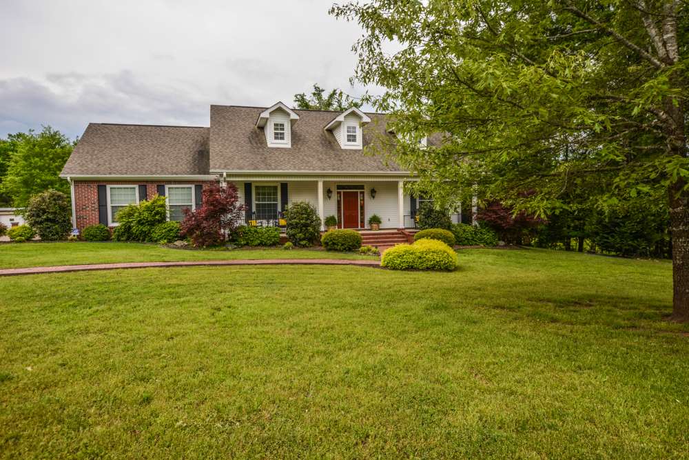Off a quiet country lane near Lake Ouachita on 2 magnificent acres sits a fantastic & meticulous like-new brick/siding home w/ 3 bedrooms, a glass enclosed sunporch, a low-maintenance composite deck w/ an outdoor cooking station, an awesome double door workshop, & a 20 kw back-up generator that runs the whole house and workshop in the event of a power outage.  Along with all of this, you will absolutely love the peaceful setting w/ lavish landscaping & its beautiful split rail fencing surrounding it.